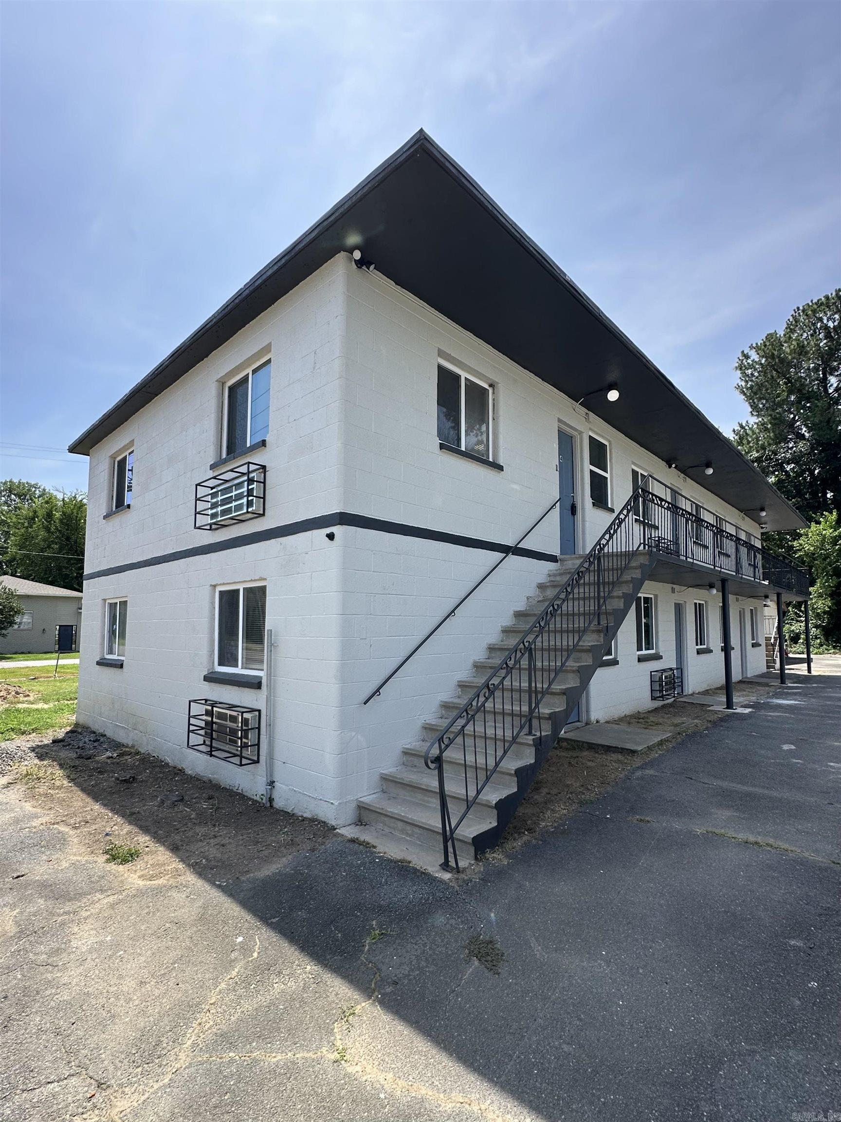 Here is a 6 unit Multi Family that has been fully updated within the last few years from all new electrical, plumbing, flooring, roof, paint, etc (From the Studs). This Multi family complex is located just a few blocks away from North Little Rock High and Pulaski Technical. All units are 1 bedroom 1 bath 100% occupied. ***There is a additional lot and building that is included - This buiding/shop will be leased for 2 years that will increase the monthly cash flow.