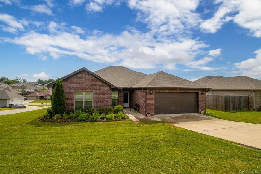 If you love 10 foot ceilings for starters, then check out this Saline County beauty! Nicely situated on a corner lot allows for more privacy and has pretty street appeal & landscaping. How about lots of space with 4 bedrooms and 2 full baths! Luxury vinyl in living area & kitchen / ceramic tile in baths and laundry. Spacious kitchen with slab granite, stainless stove & microwave, island as well as pretty corner windows. Split floor plan boasts a large open living room with natural light & wood burning fireplace! Primary suite w/double sinks, tub, step-in-shower & his/her closets.2" blinds thru out! Fully privacy fenced in backyard. RD financing accepted as well as VA, FHA, conventional. Come check it out! You'll be glad you did!