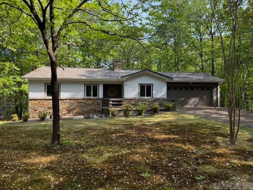 Gorgeous and UPDATED in every way! NEW floors, NEW roof, NEW paint, NEW fans! This level driveway and quiet street make this home fabulous! Besides the 2 bedrooms, there is an Arkansas room AND an office giving you room to spread out and make this home your own! HUGE walk in closet in primary bedroom. NEW stove. Gas fireplace with full propane tanks ready for cooler temps! Must see to believe....won't last long! Comes with washer and dryer and refrigerator! Better pics coming soon...if it lasts that long!