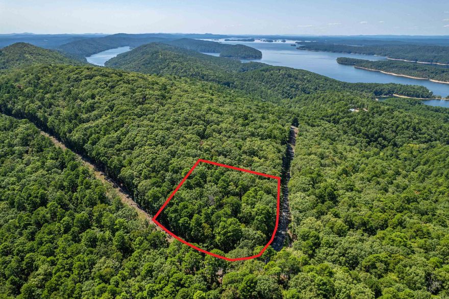 LAKE OUACHITA LOT!!! A RARE FIND!!!! Imagine building your dream home and creating lasting memories on a magnificent corner lot overlooking the peaceful vista of Lake Ouachita National Forest and LAKE VIEW in winter months. This beautiful property is located in Lake Ouachita Shores subdivision and only a mile from the shoreline of Lake Ouachita known as the cleanest and most beautiful lake in Arkansas. The property has access to a private boat launch and picnic area in secluded Holiday Bay. Don't miss out on this secret retreat. It is truly a little slice of heaven!