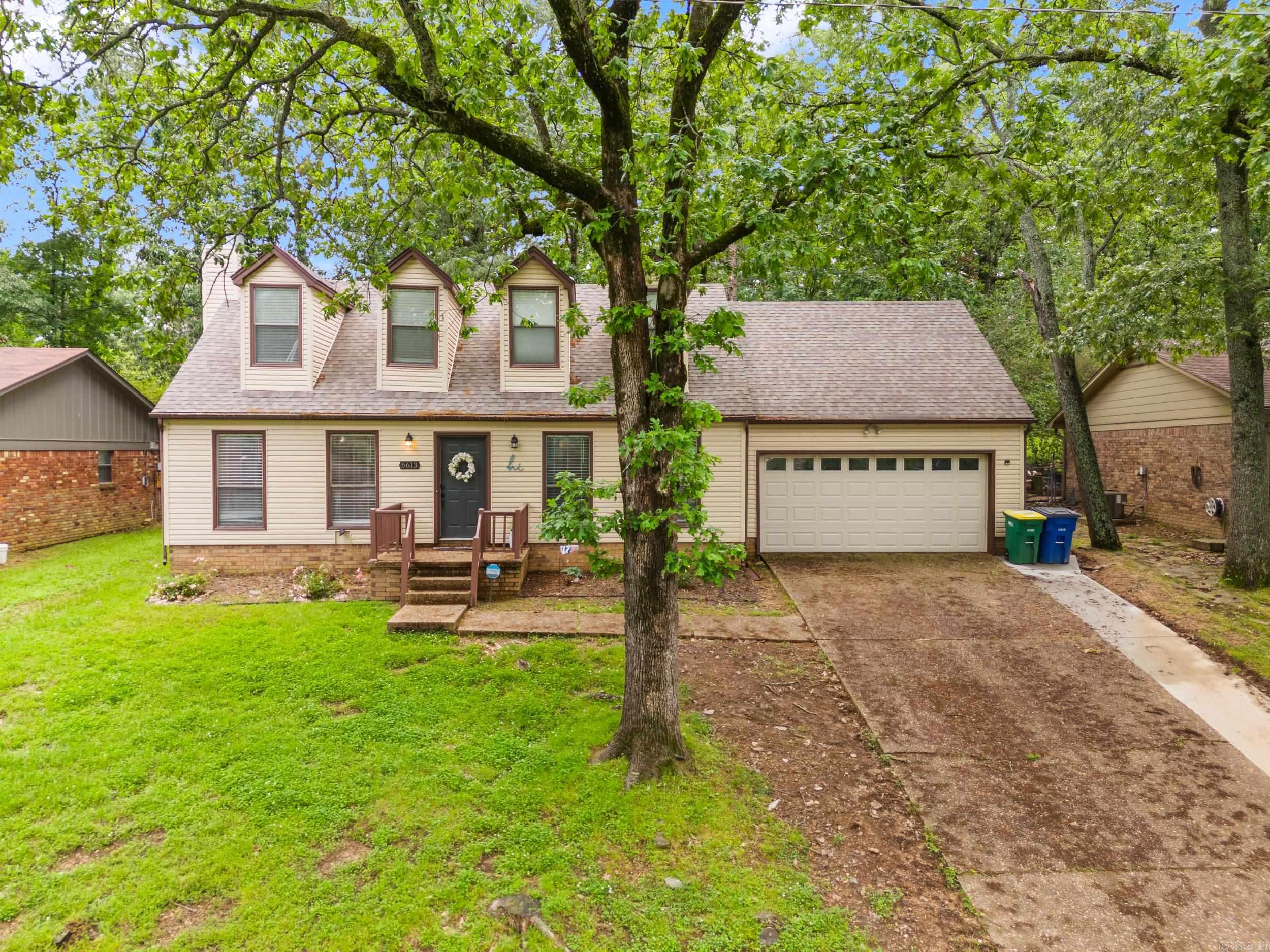 Fantastic location with quick access to North Little Rockās shopping, dining, and outdoor amenities! This beautifully updated home features luxury vinyl flooring throughout the main level and upstairs bath, quartz countertops in the kitchen and bathrooms, updated lighting, and fresh carpet upstairs. The spacious living area includes a wood-burning fireplace, and the main-level primary suite offers a generous walk-in closet. Upstairs you'll find two large guest bedrooms with ample closet space, a Jack-and-Jill bath with dual vanities, and a walk-in attic for extra storage. Recent updates: Roof (2021), Fence (2022), Sunroom Addition (2023), and Huge Patio (2023). The newly added sunroom opens to the oversized backyard patioāperfect for relaxing or entertaining. This one checks all the boxes!