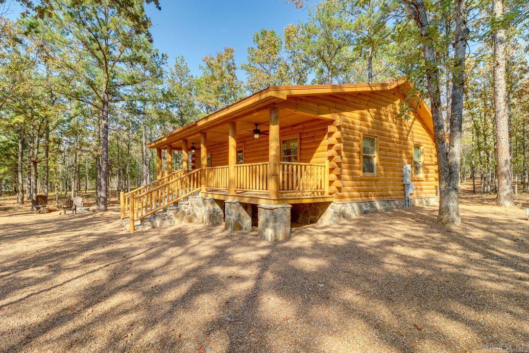 Rare opportunity to own a proven income-producing investment package on 6 wooded acres near Greers Ferry Lake! These two nearly new, fully furnished cabins each with 864 sq ft heated and cooled plus large covered porch offer 2 bedrooms and 1 bath, comfortably sleeping five. Located just one mile from the Tumbling Shoals boat launch and Corps recreation swim beach area. Guests love the peaceful wooded setting, fire pits, furnished porches, rustic finishes, and easy access to lake recreation. With excellent reviews and strong positive cashflow, these short-term rentals are truly turnkeyācompletely furnished, WiFi, central HVAC, and full kitchens. Property has plenty of room to add additional cabins. Whether youāre seeking steady investment income, a family retreat, or both, this property delivers immediate returns and long-term appreciation potential. Enjoy lake area living while building wealth with two high-demand vacation rentals. *Shown by appointment only. No exceptions. ABSOLUTELY NO TRESPASSINGādo not enter the property or disturb guests without a licensed agent present.*