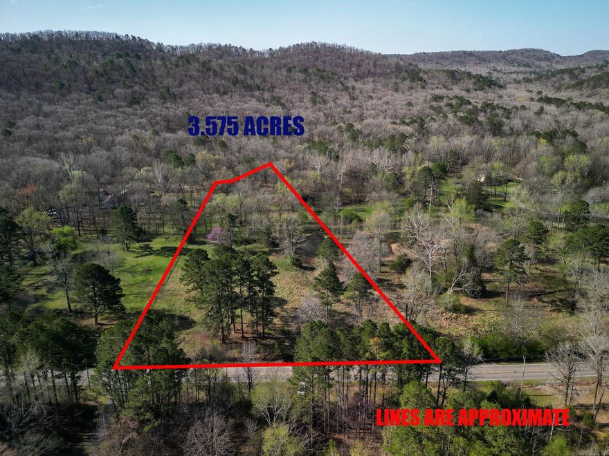 Discover the perfect blend of peaceful country living and convenient access to town on this beautiful 3.5+ acre tract just minutes from West Little Rock. Located only 1–2 minutes from the intersection of Kanis Road and Ferndale Cutoff, you'll enjoy quick access to local favorites like Ferndale Market, a gas station, Dollar General, a liquor store, and the nearby community park and creek.  The property features flat, usable land, making it an excellent setting to build your dream home. In the back of the property, you'll find access to the Little Maumelle, offering a scenic natural backdrop and a relaxing place to enjoy the outdoors.  If you're looking for space, privacy, and the tranquility of the countryside without being far from everyday amenities, this property offers a rare opportunity in a desirable area.