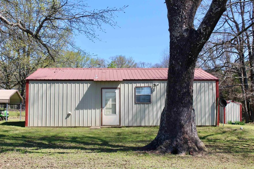 The property is perfect for hobby farming, with plenty of space for horses, goats, and chickens. It includes several shops and a barn, as well as fenced areas for your animals. The home itself is a charming country-style house with a cozy living space with sheetrock/wood walls. The house features two bedrooms, with the master bedroom boasting a large walk-in closet. The laundry room is spacious and can double as a storage room. Additionally, there's an attached covered storage area with a rolling door. There is an active well on the property that serves as the main source of water for the home. The septic system was serviced in 2017. The property comes with appliances, including a refrigerator, washer, and dryer. Overall, this is a must-see property for anyone looking for a rural lifestyle.