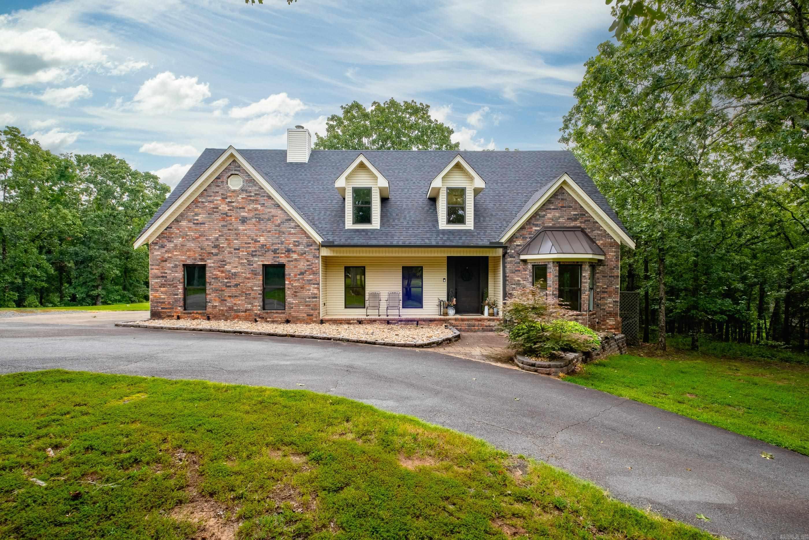 A rare find!!This newly updated home offers the privacy of the country on 5 acres just minutes from Sherwood. This 4 bed 3.5 bath home has all the space you need for a growing family. The all new kitchen has custom cabinetry, quartz counter tops, quartz backsplash, a farm style sink, pantry and adjoining mud room with great custom storage cabinets. The primary suite is on the lower level with his and hers closets, large bathroom, and beautiful views of the property. Upstairs you will find 3 bedrooms, 2 full bathrooms, a bonus room, laundry and extra storage space. Outside you can enjoy the tranquility of the country from the covered front porch with goldfish pond or the new back deck. You will have plenty of parking space with a nice circle driveway and 2 car side load garage. There is a storage building out back with plenty of room to add a shop, pool, pond or anything your heart desires!! Roof 2023 Cooktop 2021 Dishwasher, microwave and oven 2025! Washer and dryer convey as well as a 1 year 3rd party warranty.