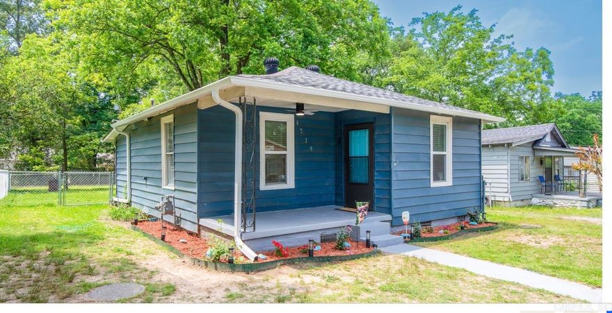 This home is ready for move-in.  The home was renovated: Upgraded kitchen, bathroom, new appliances, new floors throughout, freshly painted, light fixtures, wall air conditioning & heating, lots of windows, including window over sink for your planter, new roof, large fenced backyard ready for entertaining. This won't last long, call us to reserve your private showing. NOTE: Photographs of living room and master bedroom displays Virtual Staging/Digital Enhancements.