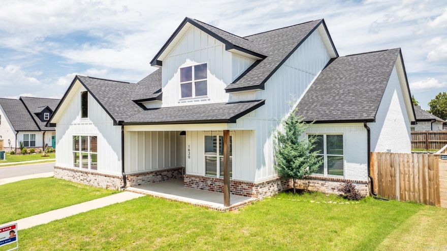 Immaculate, like new custom home sitting on a corner lot.  This all electric home features a hidden pantry, large kitchen island, locker area, tankless hot water heater, separate laundry room with sink, double sinks in both bathroom and a 2-room bonus area upstairs. Nice covered porch and patio and side entry garage.