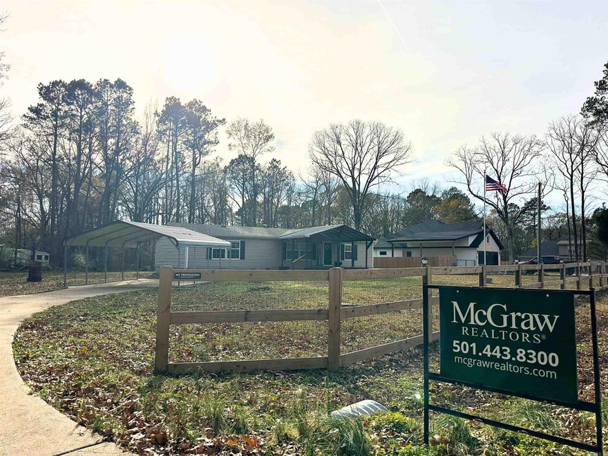 Tucked away on a peaceful cul-de-sac street, minutes from historic downtown Benton, Arkansas, this charming manufactured home on a permanent foundation, feels like a quiet country retreat wrapped in the convenience of town. Resting on approximately three-quarters of an acre, the property offers room to grow and take in all of life's moments from the large covered deck!  Step inside and you’re greeted by a large, open living room, warm and inviting, the perfect place to gather, unwind, or simply let sunlight spill through the wall of windows as the day drifts by. The huge kitchen is the heart of the home—crafted for conversation, laughter, late-night snacks, and slow Sunday mornings. There’s space to cook, space to create, and space to fall in love with the everyday moments.  The huge master bedroom feels like its own private sanctuary, but the real treasure is the master suite—an indulgent escape featuring a luxurious walk-in shower that melts the world away and walk in closet space that is fit for a Queen!  Two additional bedrooms offer comfort for family, guests, or a quiet home office.  Surrounded by serenity and only two minutes from the new bike park and trails!