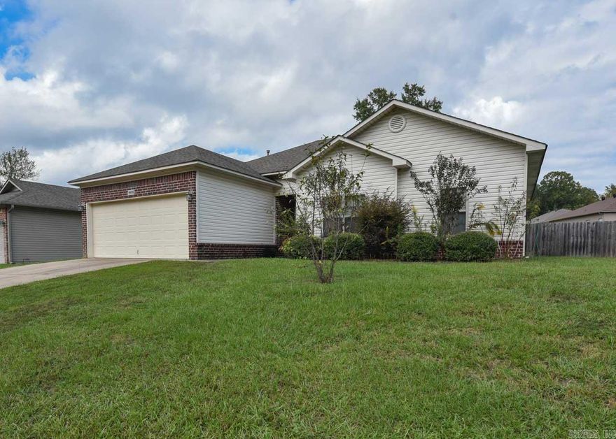 This beautiful split bedroom floor plan with hardwood floors in the great room. Cozy fireplace.