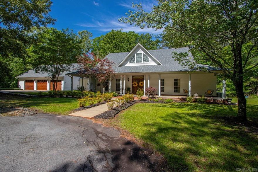 WOW! Privacy, space, and custom details come together beautifully in this stunning 3,266 sq ft home nestled on over 12 secluded acres! Featuring 4 bedrooms, 4 full bathrooms, a bonus room, office, formal dining room, and a spacious 3-bay garage. There is also a  pantry and room over the garage for storage. From the moment you arrive, you’ll love the inviting wraparound porch, flagstone walkway, and peaceful setting surrounded by nature. Inside, the home features soaring ceilings, abundant natural light, beautiful LVP flooring installed in 2020, and a warm living area centered around a cozy woodburning fireplace. The spacious kitchen is designed for entertaining with quartz countertops, tons of counter space, a large breakfast bar, breakfast nook, and formal dining area. The oversized laundry room includes an attached office space, giving you flexibility for work or hobbies. The primary suite is a true retreat with heated tile flooring in the bathroom, quartz countertops, porcelain tile shower, soaking tub, slide-out cabinetry, and a huge walk-in closet. Freshly remodeled bathrooms downstairs. Upstairs bedrooms feature double closets & private bathrooms, & a bonus room. Preapp. req.