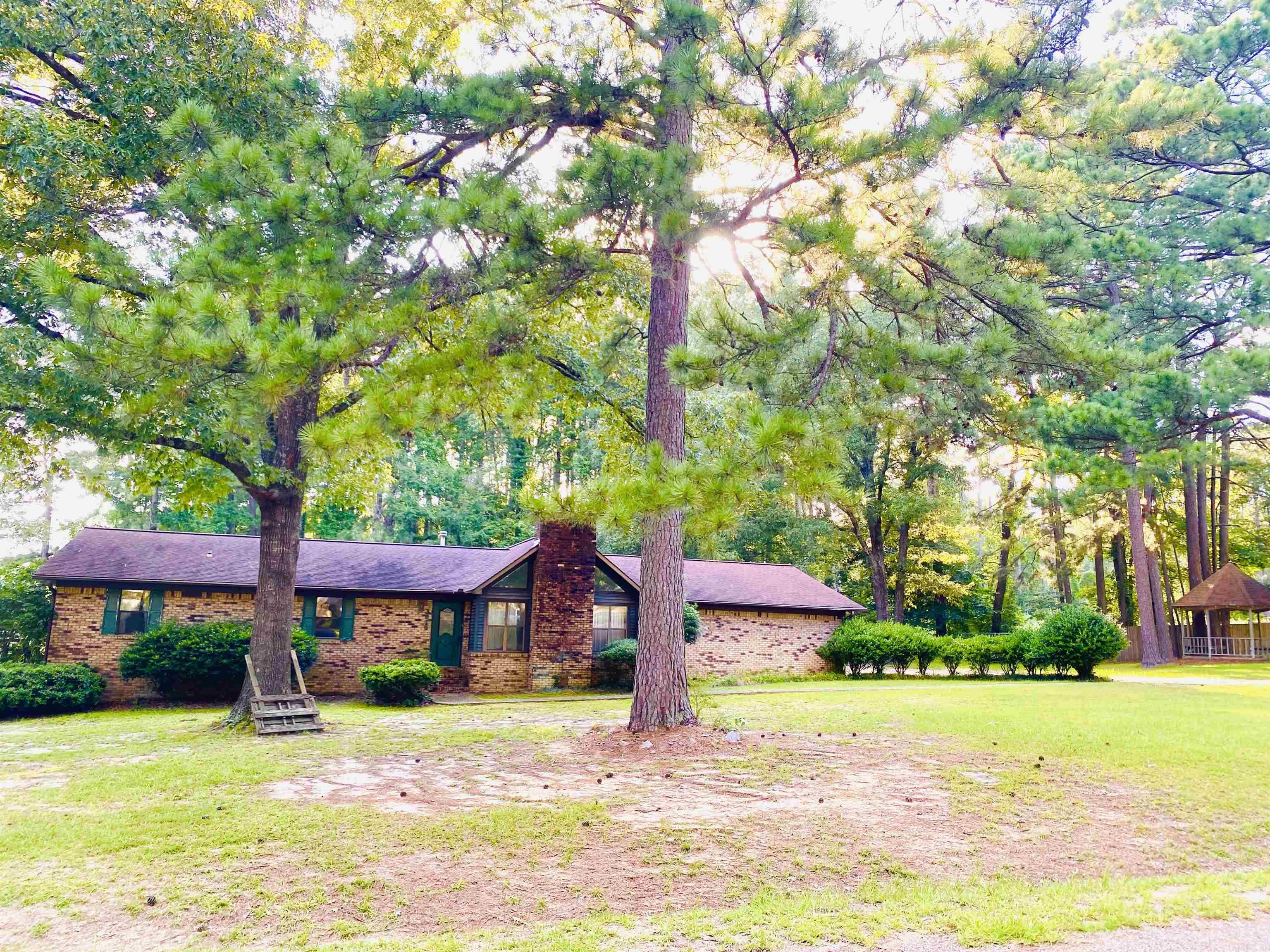 Just outside the city limits, 3670 Braxton offers space, privacy, and potential! This 4 bedroom, 2 bath home sits on 2.06 peaceful acres, giving you a quiet country feel with the convenience of Camden nearby. Inside, the large great room features vaulted ceilings and a cozy fireplace, perfect for relaxing or entertaining. The home also includes a 2 car garage and plenty of room to grow. With a little updated, this property could truly shine. Don't miss your chance to make it your own.