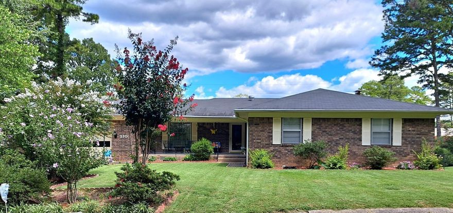 Pride of ownership shines in this exceptionally clean 3-bedroom, 2 bath home. Step inside to find a well maintained interior with spacious living areas, ideal for comfort and functionality. The attached garage features built-in storage, providing plenty of room for tools, hobbies, or seasonal items.   Outside, enjoy stunning landscaping and a serene backyard with a covered patio and large deck - perfect for relaxing or entertaining year-round. This move-in ready home offers peaceful living with thoughtful details throughout.