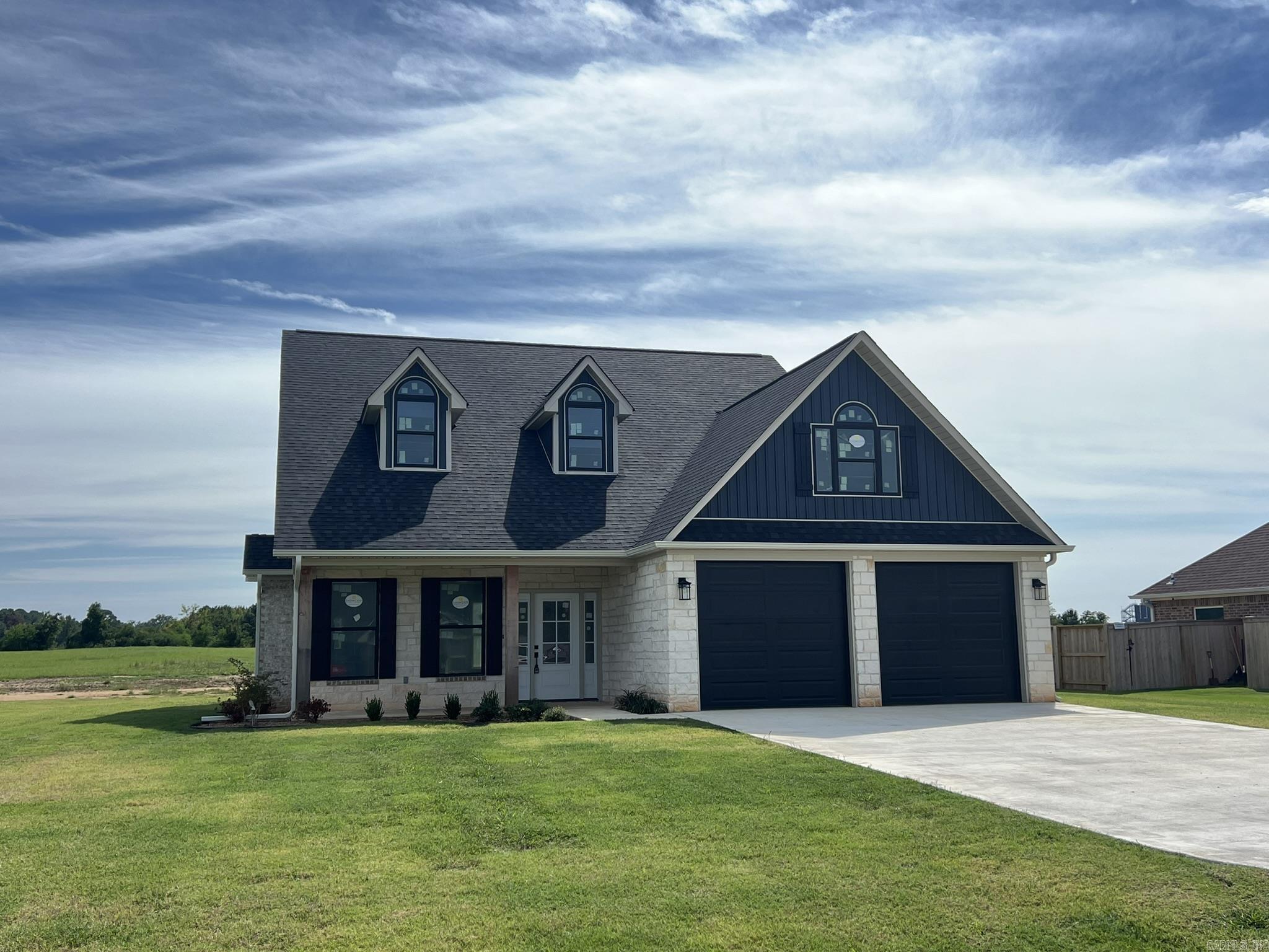 Super cute Farmhouse style new construction. Downstairs is the laundry, Family, half-bath, eating area, kitchen, walk-in pantry & main suite. The main bath is huge with a soaking tub, walk-in shower & separate vanities. There are 2 walk-in closets off the main bedroom. Upstairs has 2 bedrooms, 1 w/ private office/playroom/extra storage (heated & cooled), Large Bonus Room, full bath, open loft area overlooking main living area. This space would also make a great office, playroom or reading area. Floor plan attached in Assoc. Docs does not show the private office that is mentioned above. SELLER WILL PAY UP TO $10,000 for Buyer for Closing Cost