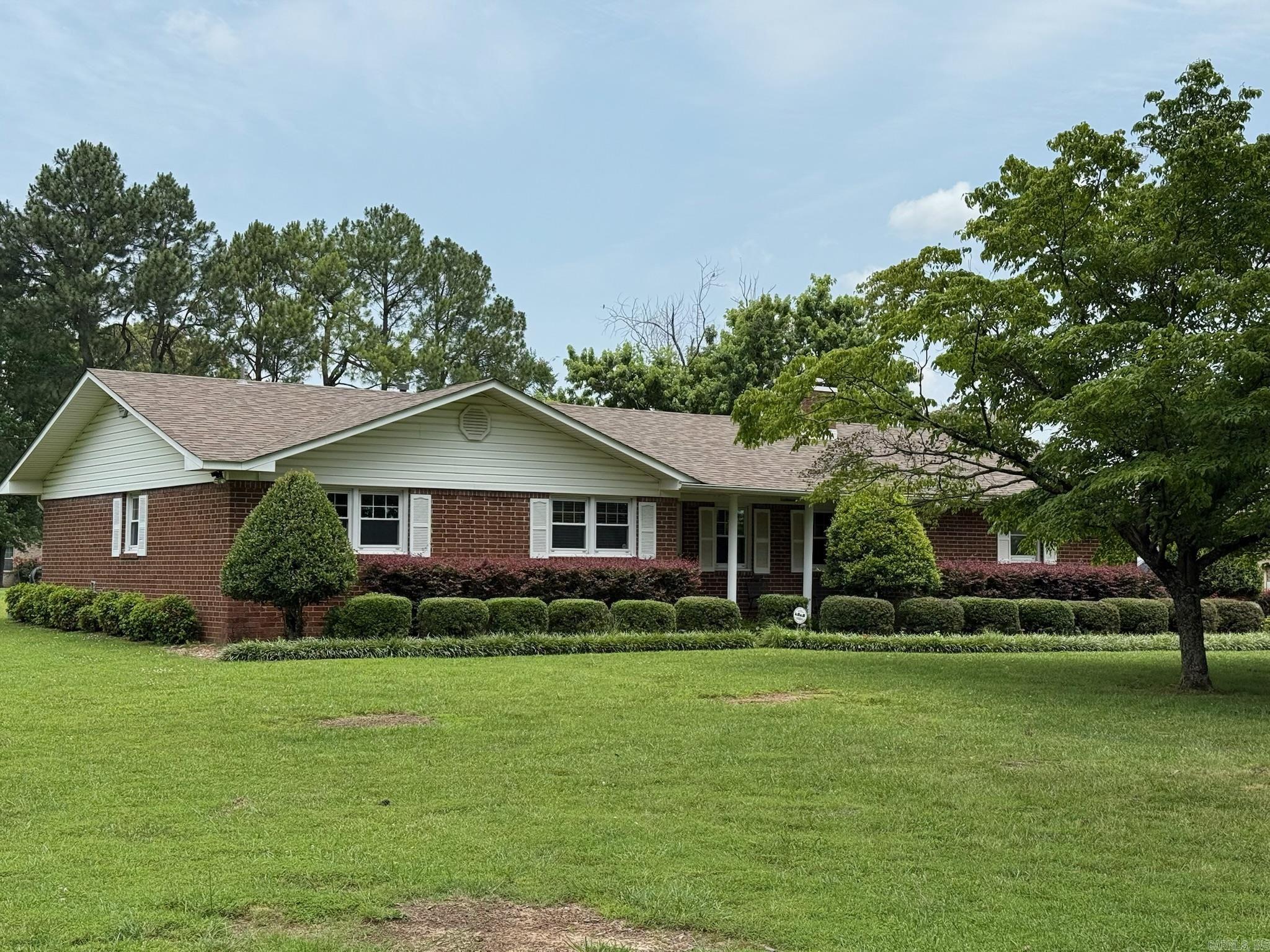 Well-maintained 3-bedroom, 2-bath brick home on 1.29± acres in Jonesboro. This single-level property offers an open layout, spacious kitchen and living areas, and a cozy fireplace. The home features central heat and air, wood flooring, and an attached 2 car garage and multiple outbuildings. Located just minutes from shopping, schools, and Arkansas State University, this property combines comfort and convenience with room to grow. Don't miss the opportunity to own a home with a large lot in a desirable area. This property is up for AUCTION ONLINE at www.soldasap.com Bid now through July 31st @ 3PM. Call 870-236-6117 for more information and how to bid.