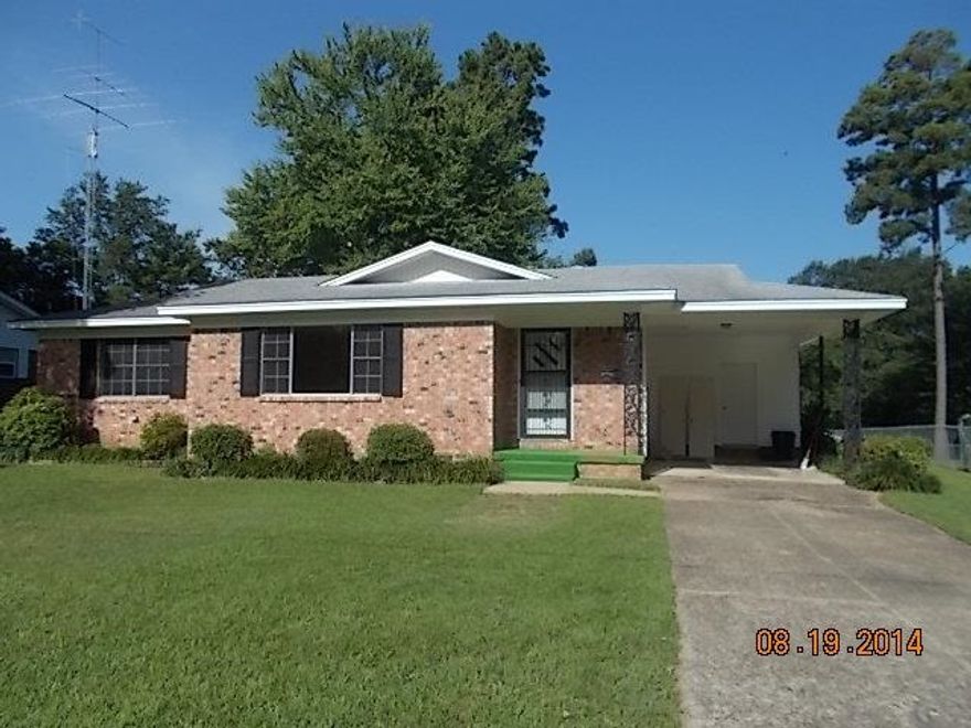All brick beauty ready to move in!  Find comfort in this 3 bedroom home with hardwood floors.  Spacious kitchen, lots of storage and separate laundry room.  Very nice level yard with covered backyard patio and storage building. See Agent Remarks