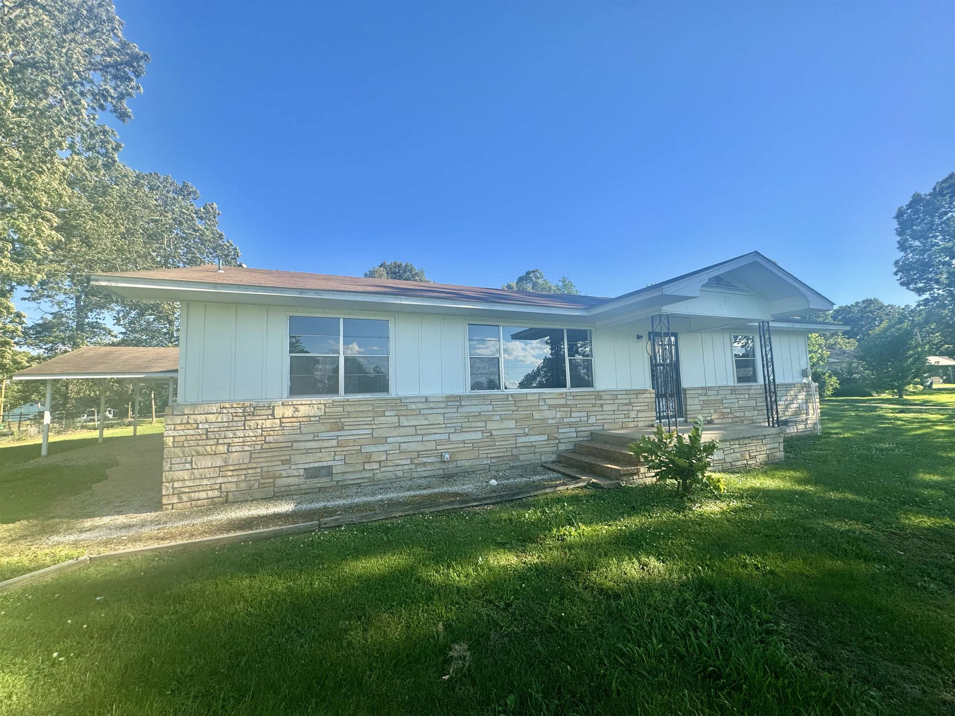 Versatile & Move-In Ready ā Live, Work, or Invest in Highland! This beautifully remodeled 3-bed, 2-bath home offers the best of both comfort and potential. With approx. 1,400 sq. ft., central heat & air, and a two-car carport (or future patio space), itās ideal for a growing family, downsizing retiree, or savvy investor. Situated on a spacious 1.82-acre level lot directly across from Highland Schools, this property delivers unmatched accessibility. Zoned residential, with commercial potential, the front lot offers an excellent opportunity to build a storefront or office and live steps awayāor use the home as a rental while your business grows next door. Updates include: ? Recently renovated interior ? Spacious layout on a corner lot ? Central heat & air for year-round comfort ? Convenient location near schools, shops, and Hwy 62/412 Priced to sell and packed with possibilitiesāthis one wonāt last. For more information please call the office
