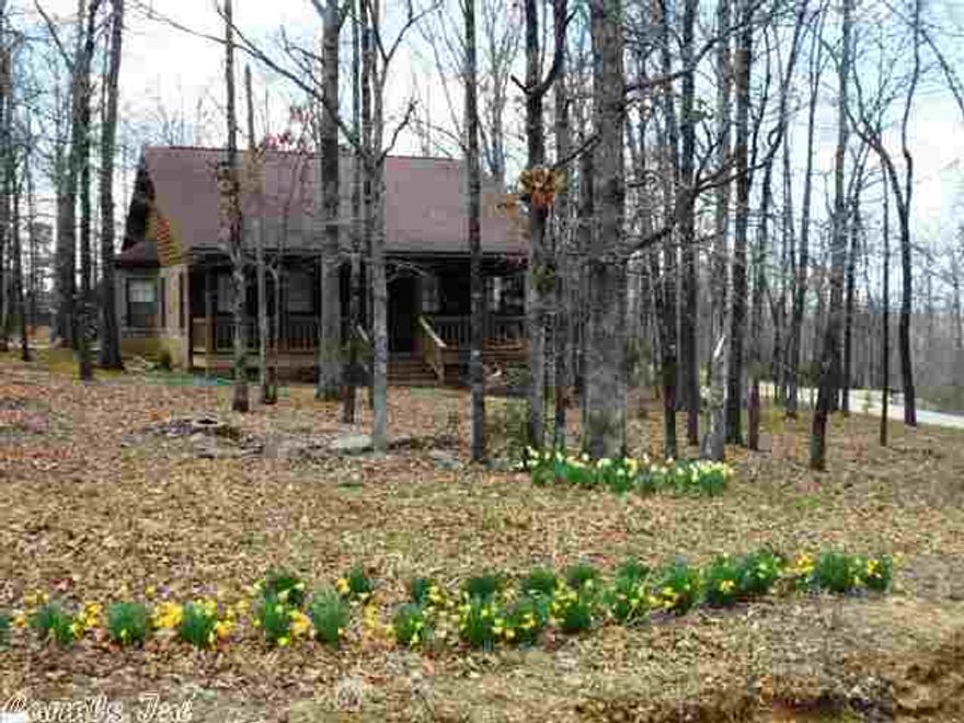 Location, Location! Close in but country, nice home with on a lovely  wooded corner lot.  Nice view, lays well. Home offers 3 bedrooms, 2 baths, bonus room, CH&A, plus pretty gas FP. Great Location.