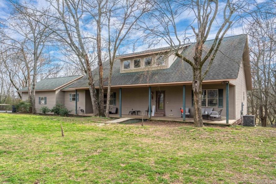 Charming Custom Home on 1.4 Acres this delightful 2001 well-kept custom home offers a blend of comfort, privacy, and versatility. Nestled away from the main road, it exudes a cozy ambiance that invites you to unwind. Let’s explore its features: Approx 2700 sq. ft. of well-designed living area awaits you w/3 bdrms & 3 full baths, this home provides ample space for family and guests. A fireplace adds warmth and charm, creating a cozy atmosphere during cooler evenings. Two separate living areas allow flexibility for relaxation and entertaining, The 2-car garage includes a workshop area, perfect for DIY projects or hobbies. An oversized additional covered parking pad ensures convenience & protection for your vehicles. The large, private backyard beckons with endless possibilities. Imagine a chicken coop, a garden area, a firepit where you can gather for cozy evenings under the stars or simply a serene space to unwind and enjoy nature.  With plenty of room, consider building a shop or additional structures.  Let your little ones and furry friends play freely in this spacious setting.  Whether you’re relaxing indoors or tending to your garden this home provides a delightful lifestyle.