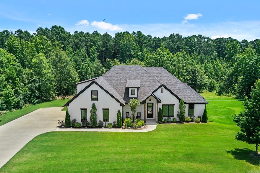 Gorgeous Custom Built home in the beautiful, Gated community of Glenwood Springs! This home features 5 bedrooms, plus a bonus room! It also has stunning granite counter tops in the large kitchen, and in the bathrooms! It is loaded with cabinets in the dream kitchen, double ovens, and a super large pantry! Master bedroom has 3 wood beams on the ceiling, and leads to the master bath with double separate sinks, subway tile in the step in shower, a soaker tub and extra lighting under vanities! The extra large master closet leads directly into the laundry room! There is a large bonus room upstairs with a bedroom and full bath. Mud room leads out to the 3 car garage! Back patio has a beautiful all wood ceiling, and overlooks a portion of the  2.60 acre wooded back yard! This one has it all! IT IS AMAZING!