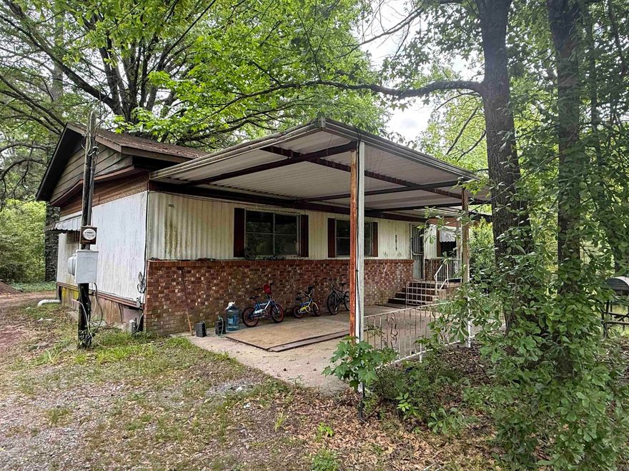7 acres property with 3 bedroom 2 bath 1200 sq ft mobile home and a 432 ft structure with 1 bedroom 1 bath.   Agents please see agent remarks
