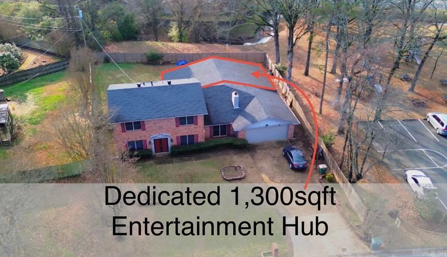 2002 Shumate in Marlowe Manor. Huge 1,363 SQFT Bonus Room! Discover the ultimate "hidden gem" in the heart of West Little Rock! This traditional 4-bedroom, 3-bathroom home offers a rare surprise: a massive bonus space with soaring 20 foot vaulted ceiling - Whether you envision a private basketball court or a creative studio, the possibilities are endless. Main level includes a formal dining room, one bedroom and a full bath, plus two living areas ideal for guests or a home office, plus wood burning fireplace. BONUS: Home video security system with TV monitors convey. Steps away from the neighborhood pool and park. Walking distance to Pulaski Academy. Minutes from top-tier shopping and dining. Bring your vision and transform this incredible space into your dream home! Schedule your tour today! 2025 New gutters & electric panel, 2023 new insulated garage door, 2023 new deck & fence, 2021 furnace and partial new driveway. 2017 roof. VIDEO TOUR AVAILABLE! AGENTS SEE REMARKS