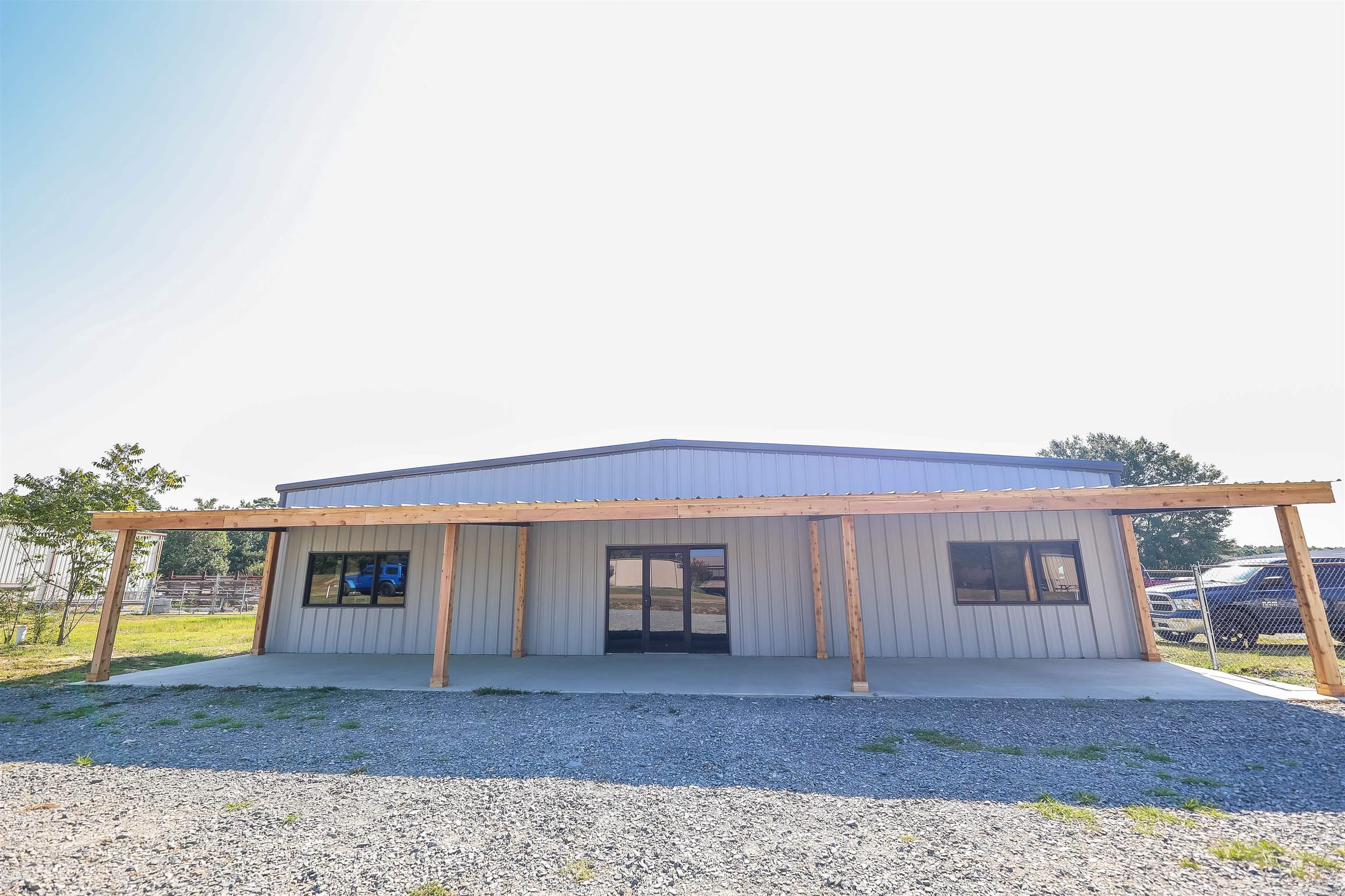 A move-in-ready gem! This property boasts 11 spacious offices, a secure safe room, a versatile multipurpose area, and a grand conference room, perfect for your business needs. Situated on 3.5 acres nestled off the industrial road, this location offers both convenience and space. Donāt miss out on this incredible opportunity for your business. The current owner is offering a one-year lease to any prospective investor interested in this property. Total square footage includes: 6387 sq. ft. H/C office* 8065 sq. ft. heated warehouse with upstairs storage and office* 1000 sq. ft. commercial paint booth** 2640 sq. ft. H/C shop** *Taken from Builder's Floor Plan **Taken from Assessor's Records.