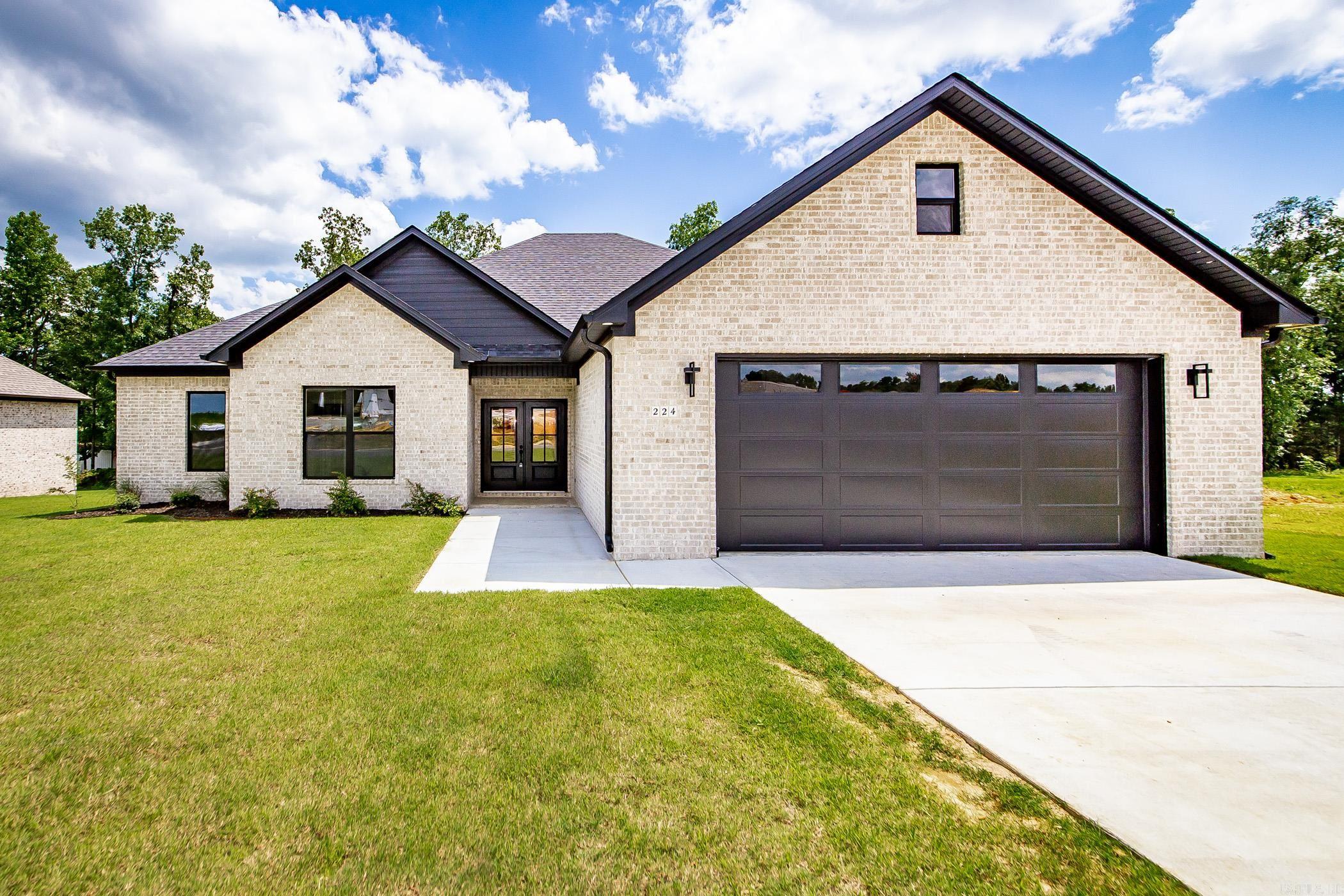 Beautiful new construction home in Hidden Valley Estates! Hardwood look tile, quartz countertops, custom cabinets, custom trim, beams and shelves, to match the custom vent-hood, HUGE custom tiled shower, large pantry, large closet and stand alone soaker tub in primary that connects to the laundry room! NextGen water proof wood floors throughout! Living room boasts brick fireplace & coffered ceiling in living room, large covered back porch, soffit/eave can lights, oversized garage and tons more. Call today! This one won't last long!