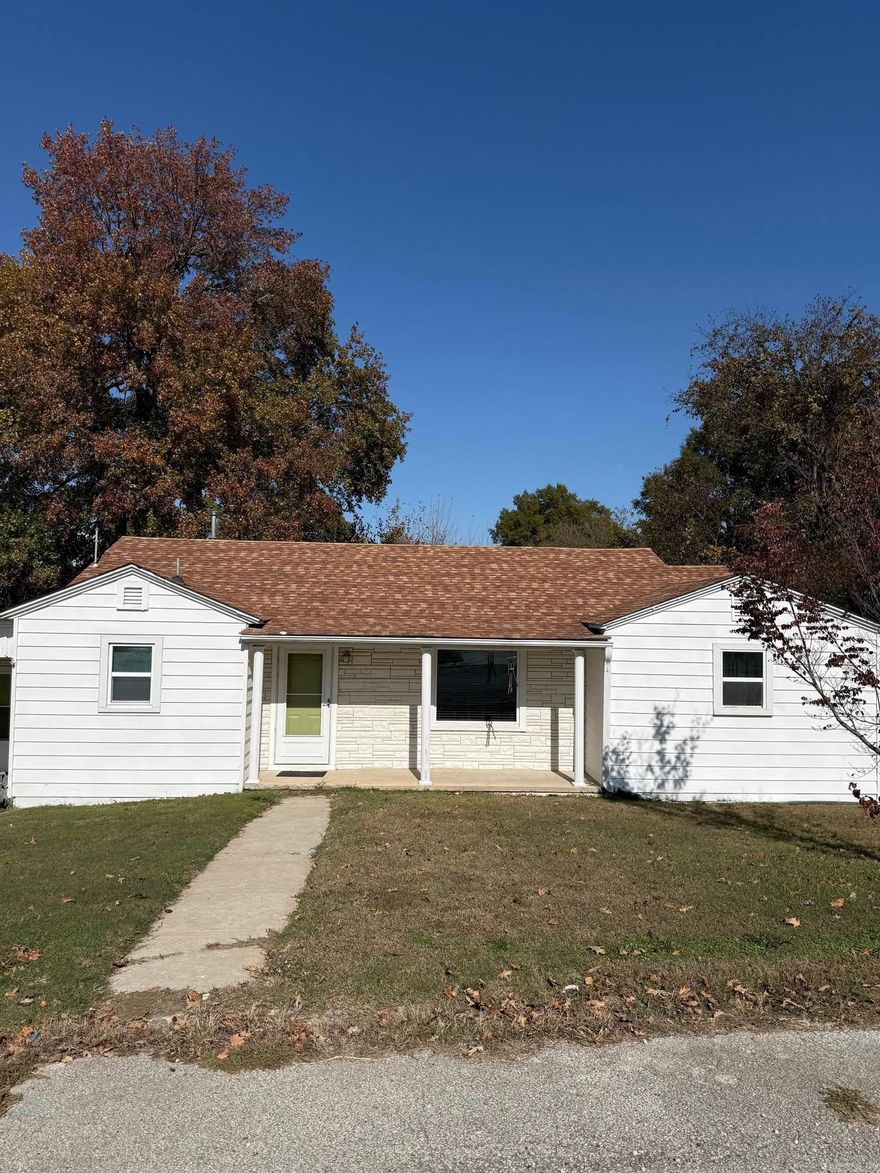 This centrally located home in Paragould is bigger than it looks from the street. The 1582 sq.ft home has lots to offer for a client that needs space and access to schools, a hospital, grocery/convenient stores, restaurants & close to Highway 49. On top of those features the home has a newer roof of 3.5 years, dishwasher 1 year, HVAC approximately 2.5 yrs., and a water tank 2 years old. Don't forget the refrigerator STAYS with house. Just outside that back door is a huge wood deck for relaxing and enjoying the outside. This home has 3 bedrooms, 1full bath & 1 half-bath in addition to a 13 x 8 bonus room. 8 Ceiling fans are located throughtout the house as well as smoke detectors.  Just off the kitchen is a laundry room AND a spacious den with a built in Centurion Safe. Located in the back yard is a concrete older storm cellar/safe area just in case the need arises. This home could be a great investment property and will be sold AS-IS!  See AGENT REMARKS! If you think this could work for you call your REALTOR agent  and schedule a tour before it's gone.