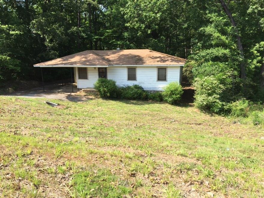 Property currently zoned Residential w/great potential for commercial redevelopment. Old 3BR 1Bath hm. on the property.