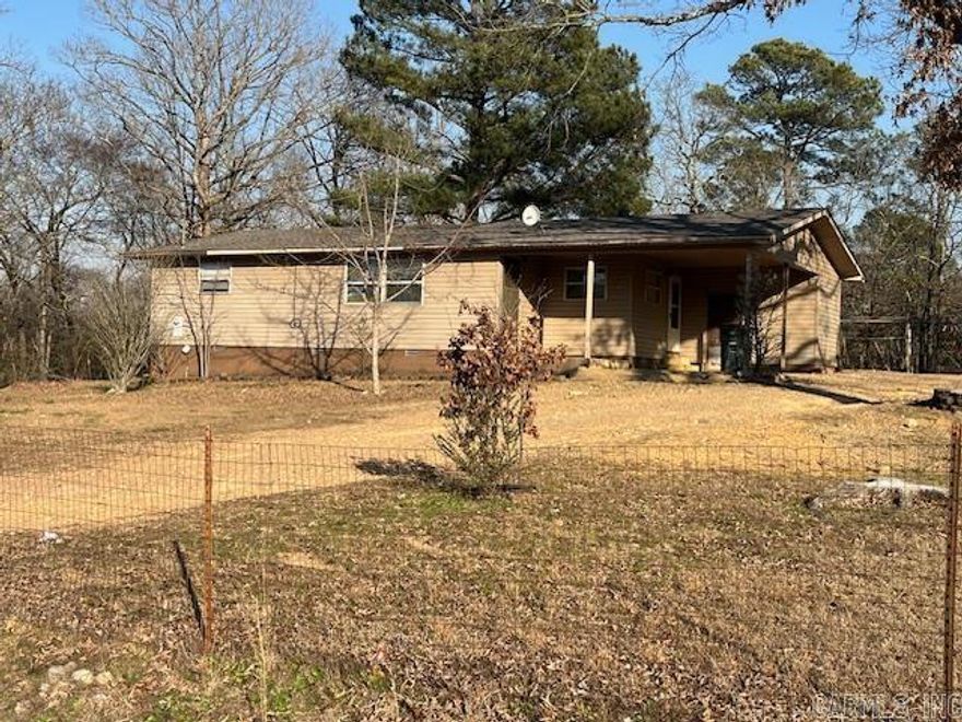 AWAY FROM THE HUSTLE AND BUSTLE, 3 BEDROOM ON 1.25 ACRES, SCENIC VIEWS FROM THE LIVING AREAS AND OUTDOOR SPACES.  ROOM TO GROW, EXTRA SPACE FOR HOBBIES, A WORKSHOP, OR A GARDEN. NEW HVAC IN 2023, UPDATED WINDOWS, ROOF APPROXIMATELY 3-4 YEARS OLD, LARGE WALK IN SHOWER, CARPORT, LAKE HAMILTON SCHOOL DISTRICT.  SELLING "AS IS".