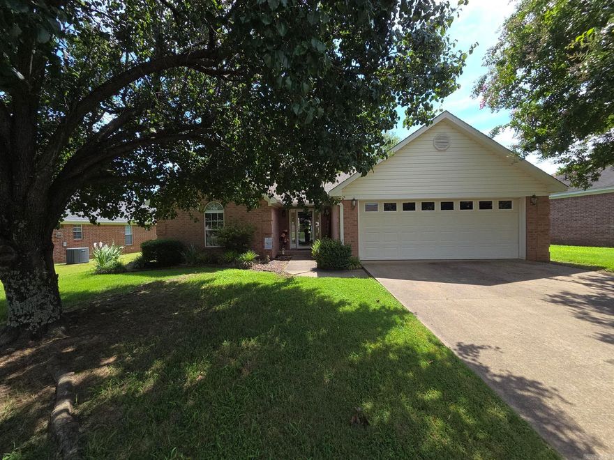 Very nice brick 3 bedroom, 2 bath home in great neighborhood. The house is on a slab & seller replaced the main bathtub combo with a walk-in shower recently. The roof is about 7 years old, the stove & gas water heater both replaced within the last year. Large living room with a gas log corner fireplace & a tiled entry area. The main bedroom has a bathroom attached with 2 separate sink areas & 2 walk-in closets. The backyard has a patio & privacy fence with shade trees & the front has good landscaping with curb appeal. The back porch has been enclosed but not added in heat & cooled area listed.