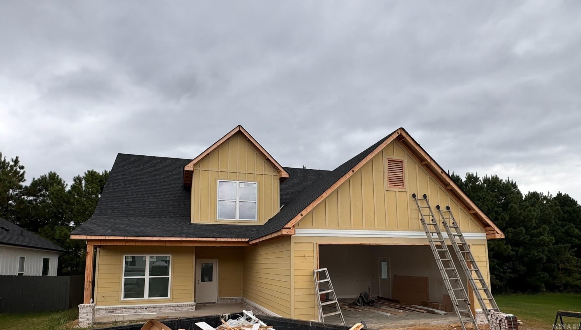 Beautiful new construction in the Midtown Bryant subdivision! Great open layout, vaulted ceilings, oversized beam, hardwood stairs, tankless water heater, and custom built fireplace mantle with wood from the Little Red River! The main bedroom is on the ground floor along with an office space. Set up your tour today!