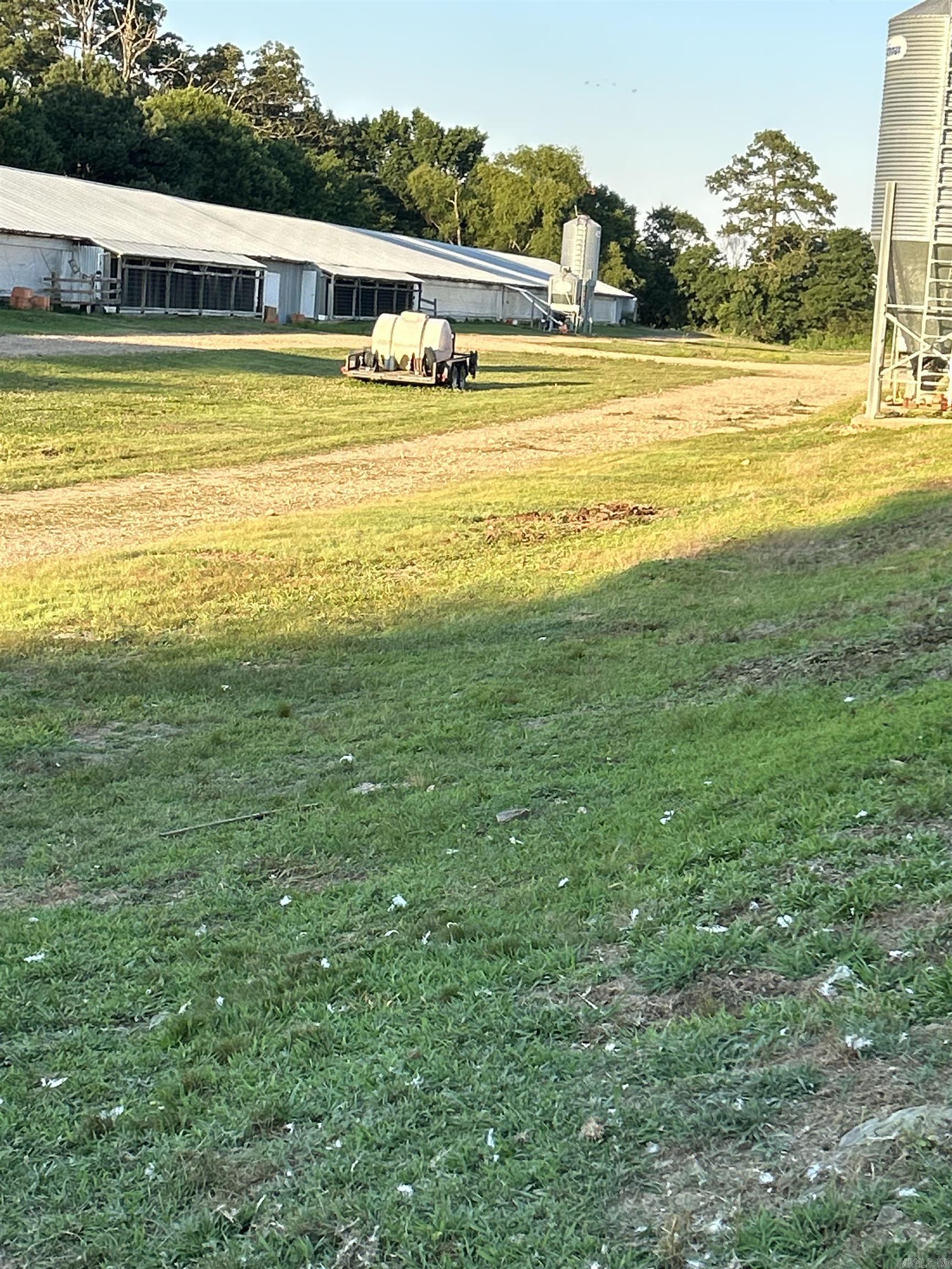 Property includes 2 - 40 x 610 Breeder Houses that sits on 7.69 acres +/-. a 1325 sq ft, 4 BR/2 Bath dwelling home. Income and expense for last year will not be fully available till 2024 taxes is prepared.