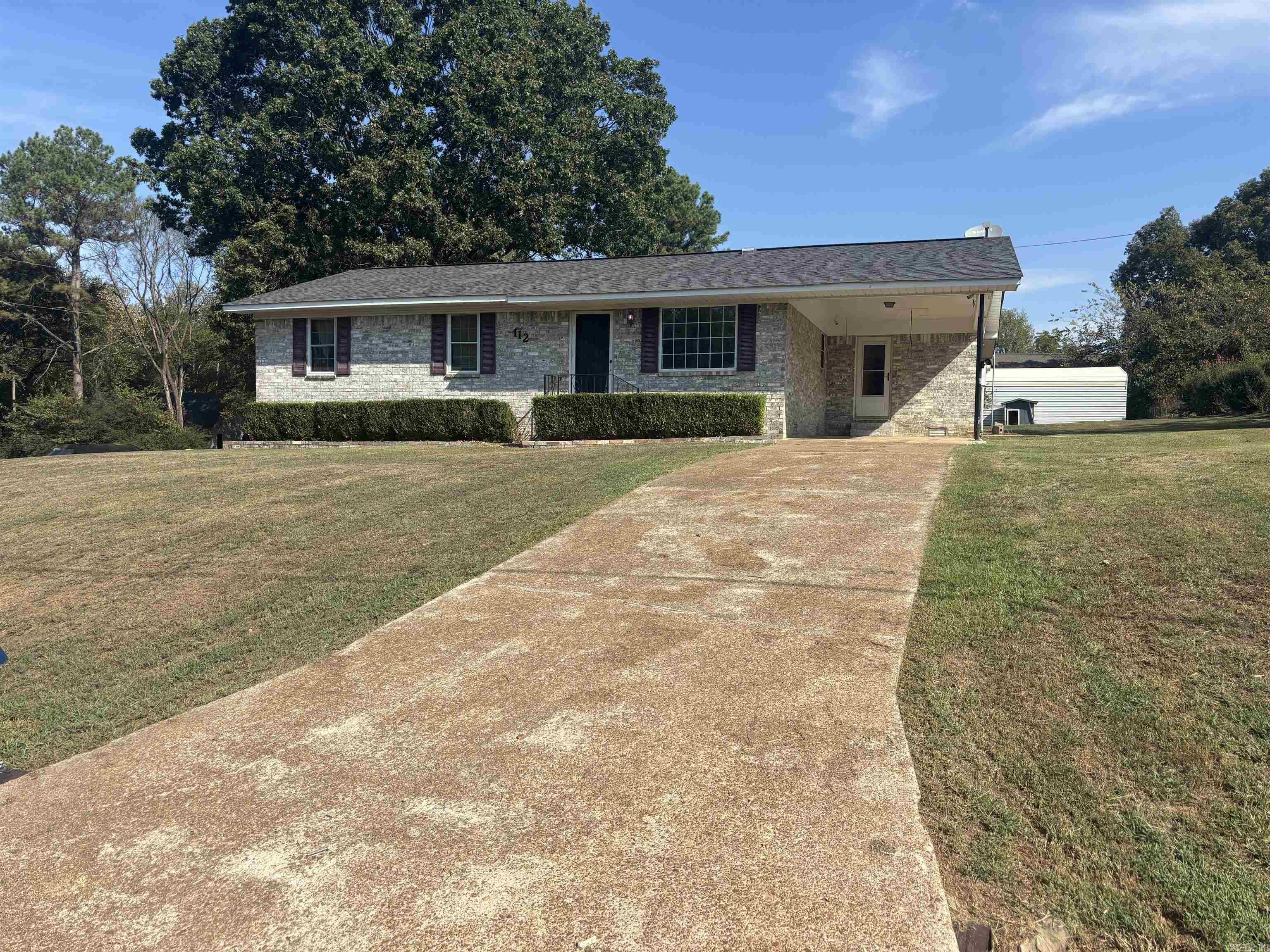 This is a charming single-family home built in 1972, offering 1,548 square feet home. The property features three bedrooms and one and a half bathrooms, making it a comfortable fit for families or anyone seeking The layout includes two living areas, a breakfast bar, and a wood-burning stove. While the exterior offers a carport, detached garage or shop, and a well-kept yard with a patio and garden space. Call Today for a showing!!!