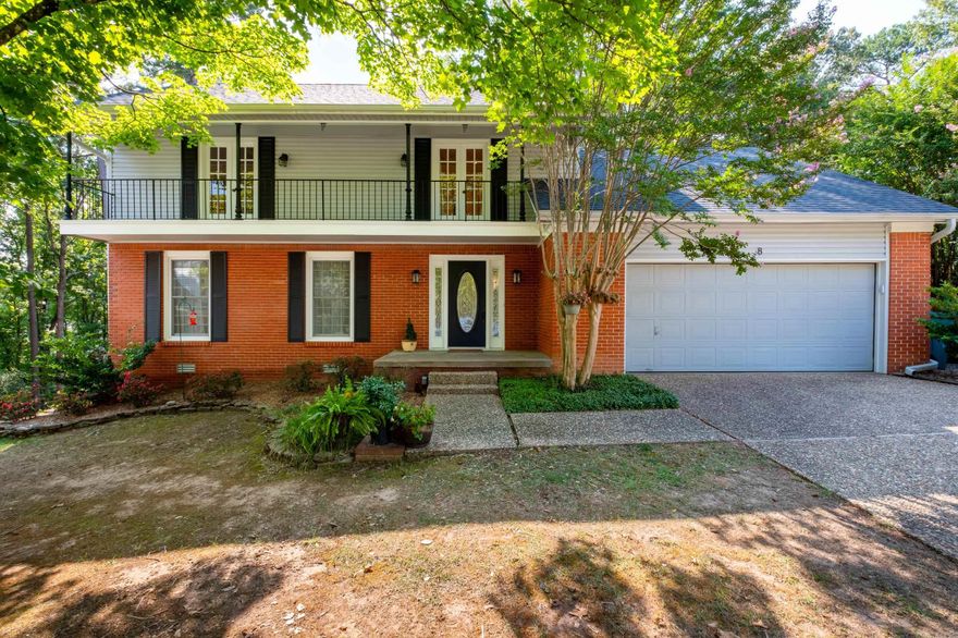 Nestled in a tranquil cul-de-sac, this classic traditional two-story home offers an ideal blend of comfort and elegance. Featuring 4 bedrooms and 2.5 baths, this residence is perfect for today's home seeker. The versatile 5th bedroom can also serve as a bonus room or playroom. Two bedrooms feature French doors to a balcony with a front yard view. The heart of the home is the modern kitchen with an eat-in dining space, seamlessly flowing into the cozy hearth room, ideal for gatherings around the fireplace. Both formal living and dining spaces provide ample room for entertaining. Upstairs, the master suite provides a peaceful retreat with an ensuite bath. Outside, the large lot hosts an expansive yard and a new, updated Trex deck perfect for relaxation and outdoor entertaining. With its inviting layout and serene setting, this residence isn’t just a house; it’s a place to call home.