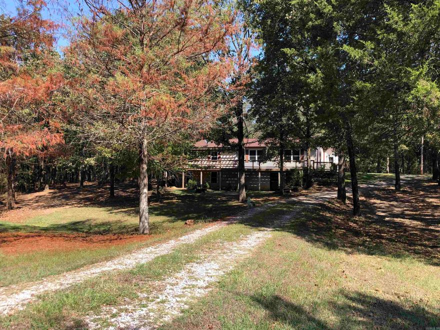 A rare find just north of Searcy offering the perfect blend of privacy, space, and comfort. Nestled on nearly 9 acres and tucked away from the road, with approx 3 acres accessible to tenant, this beautiful home provides a serene escape while still keeping you close to city conveniences. Spacious 3 bedrooms, 3 full bathrooms, including a fully finished walk-out basement for added living flexibility.  The main floor features a formal dining room, a generous living room, and an eat-in kitchen with ample counter space and a pantry.  The walk-out basement includes a large open living/game area, extra rooms ideal as office, guest space, creative studio, or extra bedrooms, plus a full bath and laundry.  Three-car garage with workbench space and extra storage building on site.  Fenced backyard ensures privacy and security.  Brand-new roof and water heater (2024) offer peace of mind.  Natural gas heating system, central cooling, and modern conveniences throughout. Washer and Dryer provided.