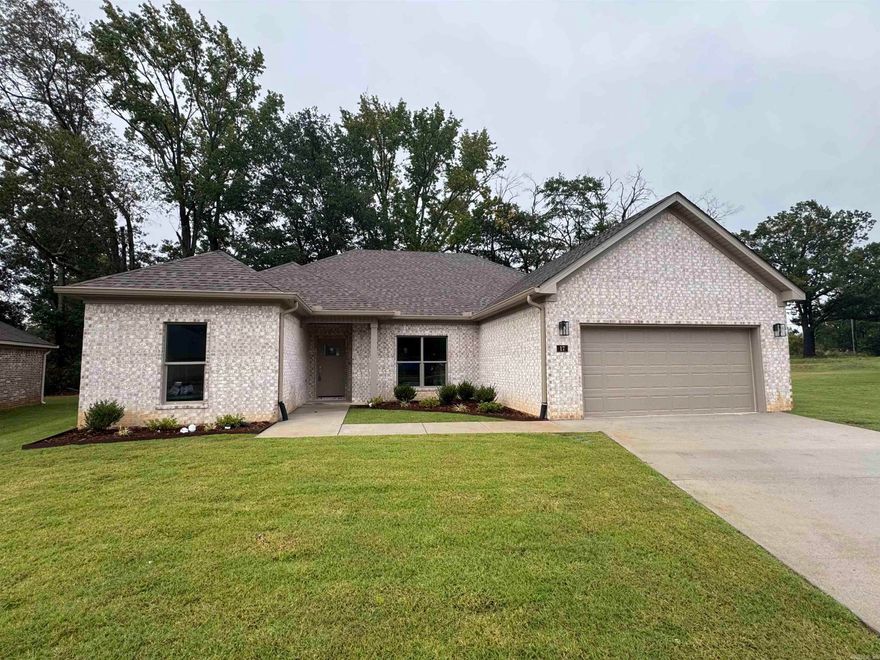 Welcome to Carmel Oaks, one of Cabot's newest communities, only 12 miles from the Little Rock Air Force Base.  This NEW construction floor plan offers 4-bedrooms and 2-bathrooms. As you enter, you’re greeted by tall ceilings, a cozy fireplace, crown molding, and an open floor plan that seamlessly connects the living, dining, and kitchen areas. The MASSIVE living area features natural light and a seamless flow into the designated dining area with a great view of the covered back patio! This home utilizes SOLAR board roof decking for energy efficiency. Other features include: floored attic space for ample storage, 42" custom kitchen cabinet upgrades, granite countertops, custom kitchen pantry with a receptacle for your coffee station, LVP flooring, tiled shower in the master bathroom, comfort height toilets, large custom walk-in master closet, 50 gallon water heater, recessed lighting AND ceiling fans, elegant finishes and neutral tones to enhance versatility. This property is also equipped with an irrigation system. Located in highly sought after Cabot School District. Several new-homes and floor plans to choose from! (Photos may not show exact finishes of this address.)