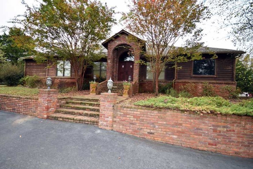 Own a 30 acre ranch in the middle of city limits!This unique property has a 6BR/5BA house,10 stall barn w/apt & 3500 sq ft outbuilding w/2 apts & w/3 phase wiring.Totally fenced w/fenced arenas.The home as been updated w/African granite,travertine tile,Viking downdraft gas cooktop,double ovens,Thermador warming drawer,Fisher Paykel dual drawer DW,2 HVAC-6 zones, SS insert in FP 2005-sensor on blowers,safe room,new roof 2009,Asphalt resealed 2012, Bricks from 1800's,Elite gate,Sprinkler sys.SEE Agent remarks