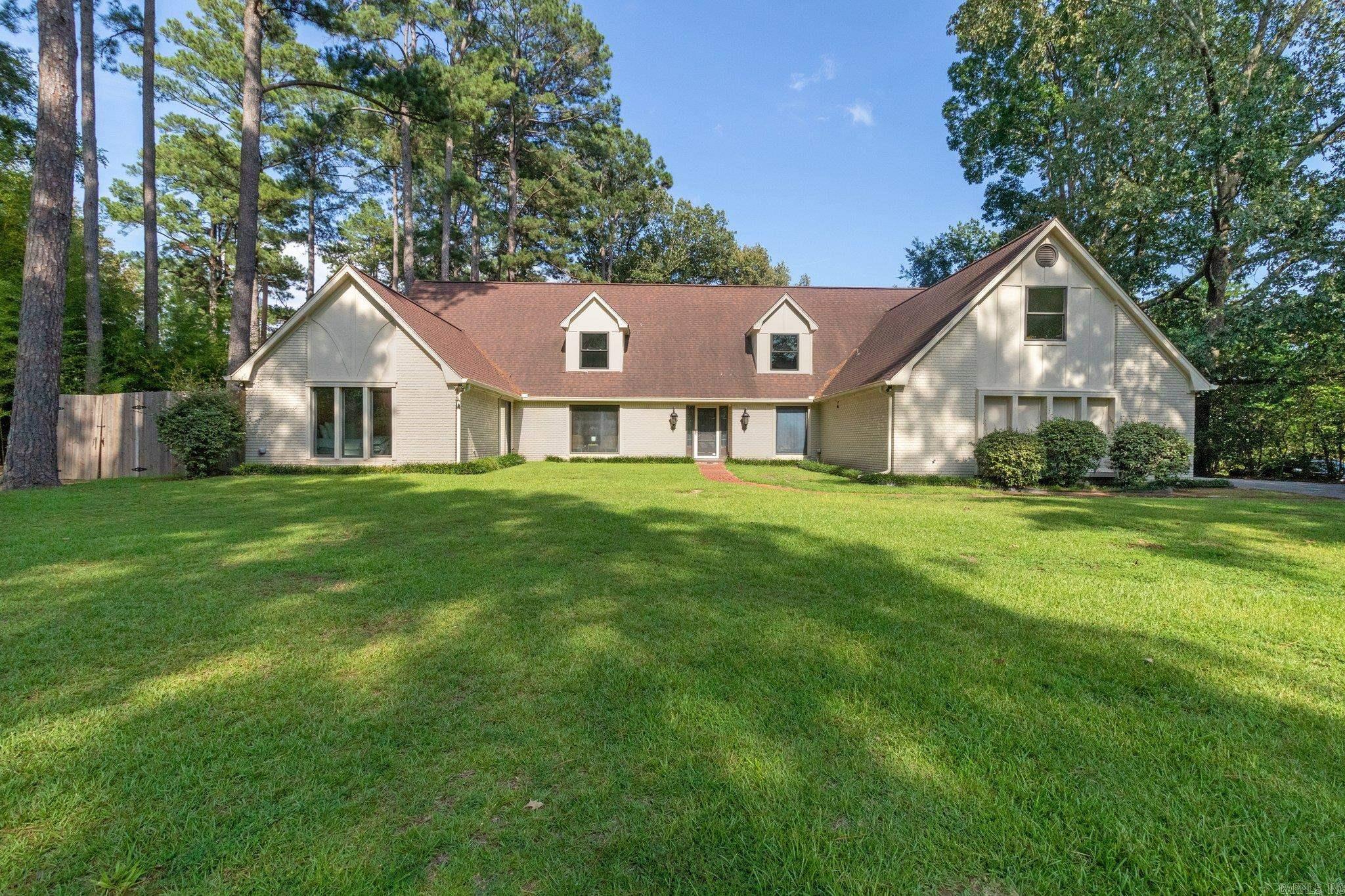 This charming Tudor style home is nestled on a large private lot in the PBCC Golf Course community. This 4941sqft home was completely renovated in 2020 and is in immaculate, move-in ready condition. With windows overlooking a large backyard, you can enjoy a beautifully designed kitchen while taking in the spectacular views. The kitchen complete with new appliances, granite countertops and double dishwashers is the chef's kiss. The home boasts formal dining and living, a cozy den with wooden beams and built-in's, 5 large bedrooms and 3.5 bathrooms and 2 bonus rooms with endless possibilities and more. Come see the amazing Tudor style home with modern touches and make it yours! Furnishings may be negotiated if buyers wish. Video surveillance on interior and exterior of home. Pre-approval letter required for viewing. Agents see remarks.