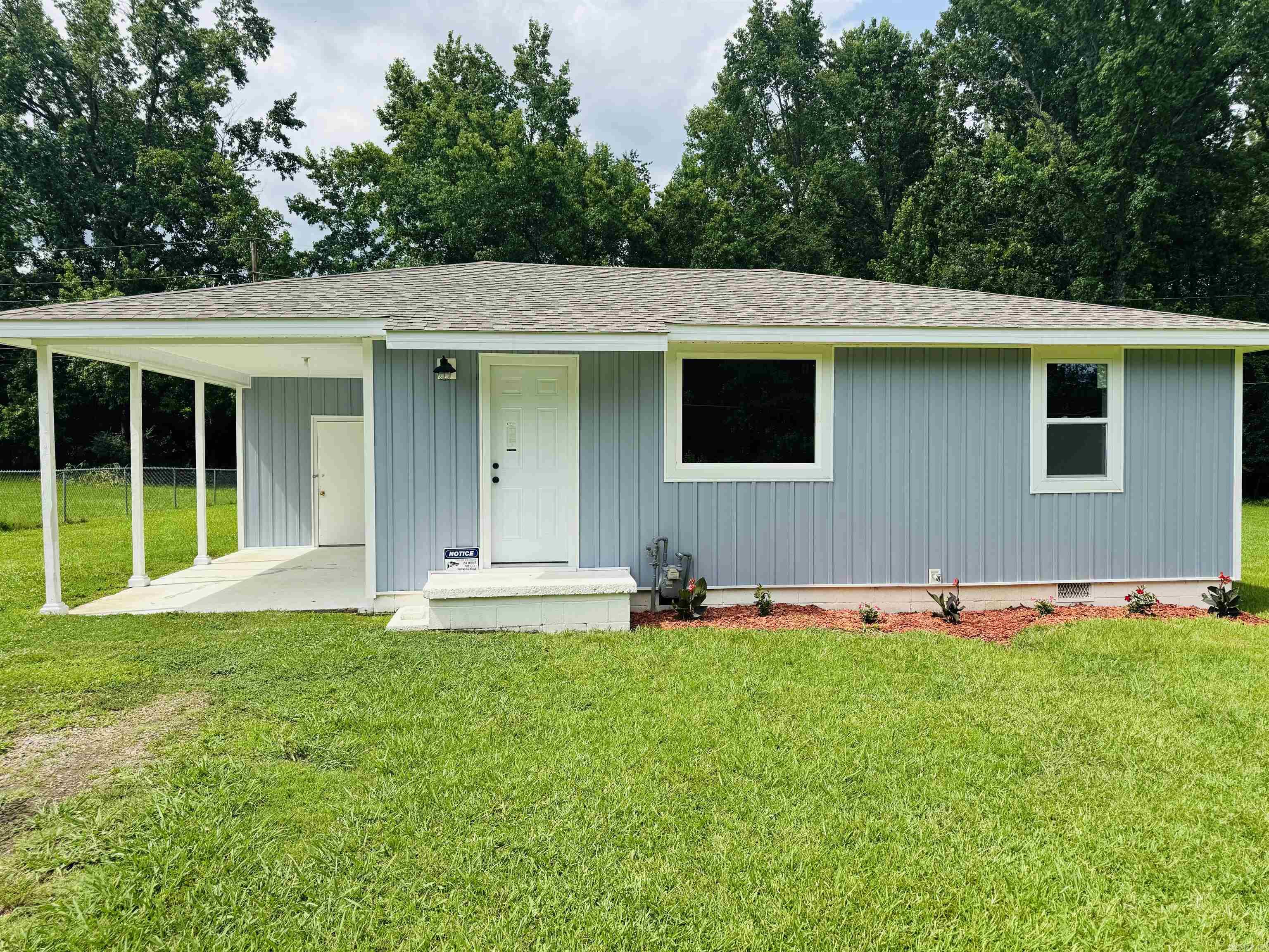 Looking for a move in ready home that won't break the bank? Here's your chance to have that and ALOT more... This completely remodeled cottage offers a great location with almost 1.5 acres right in the middle of town! To those investors looking to add to their portfolio, there is room to build multiple houses and have great cash flow! This house has had a face lift to say the least... Architectural roof, siding, windows, flooring, kitchen cabinetry, new appliances, Hot water heater, doors, lighting and much more! Central heat and air is less than 4 years old as well. Why pay rent when you can have a house payment for less! Call your agent today and check it out to make this home!