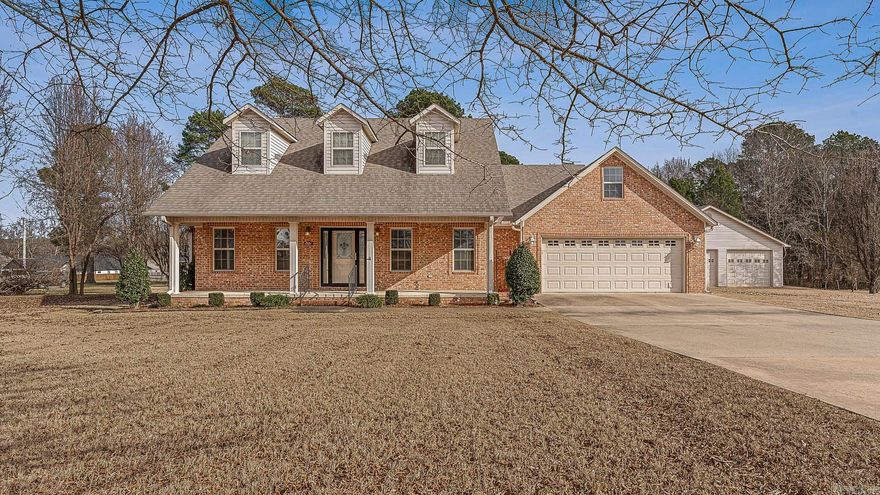 Welcome to 1901 Suburban Lane in Paragould. This inviting home offers over 2,000 square feet of comfortable living space with a thoughtful layout and great indoor-outdoor options. The long, welcoming front porch is ideal for rocking chairs and quiet moments, while the large covered back patio and grilling porch are ready for your next BBQ or outdoor gathering. Inside, the home features 3 bedrooms and 2 full baths with a split-bedroom arrangement that provides added privacy between the primary suite and guest rooms. The primary suite is conveniently connected to the laundry area, which wraps around to the primary closet and bath for easy everyday living. A formal dining area and an eat-in kitchen offer flexible space for meals and entertaining.A standout feature is the 28x32 shop with electric—perfect for storage, hobbies, or projects. This property combines functional space, comfortable living, and great outdoor areas, all in an established Paragould location.