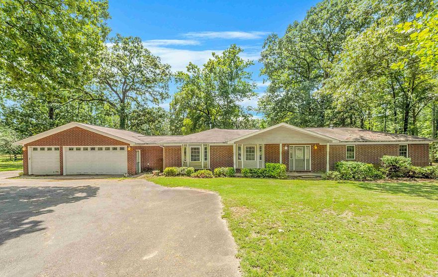 Almost 10 acres with barns, large storage buildings, 2 ponds & a GREAT 1 story house, the opportunities are endless! Come take a tour to see what YOU can do to make this property your own. Large living, dining combo room is wonderful for entertaining. The eat in kitchen offers granite counters, gas range, double ovens, tons of storage & access to the back covered porch. Original hardwoods have been refinished in the original 3 bedrooms. Primary suite has a massive bathroom & closet & access to the back porch. Welcome HOME! Agents see remarks.