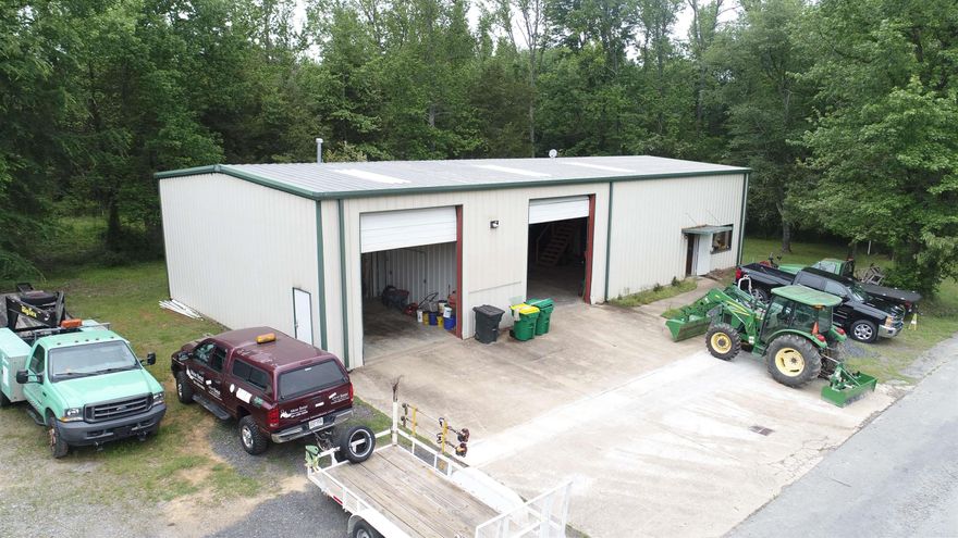 3,200 Sq-ft shop & auto building in Pulaski County with quick access to both 67/167 & Cabot. The building is designed to allow access for tall vehicles and RV's with 16' SW, 18' CH, & two 12' x 14" roll up doors. The space is divided with 2,680 sq-ft of shop area, & 520 sq-ft for office space, kitchen/break room, restroom, & storeroom. Additional 720 sq-ft upstairs framed for a 2 bedroom apartment! Call for more details!