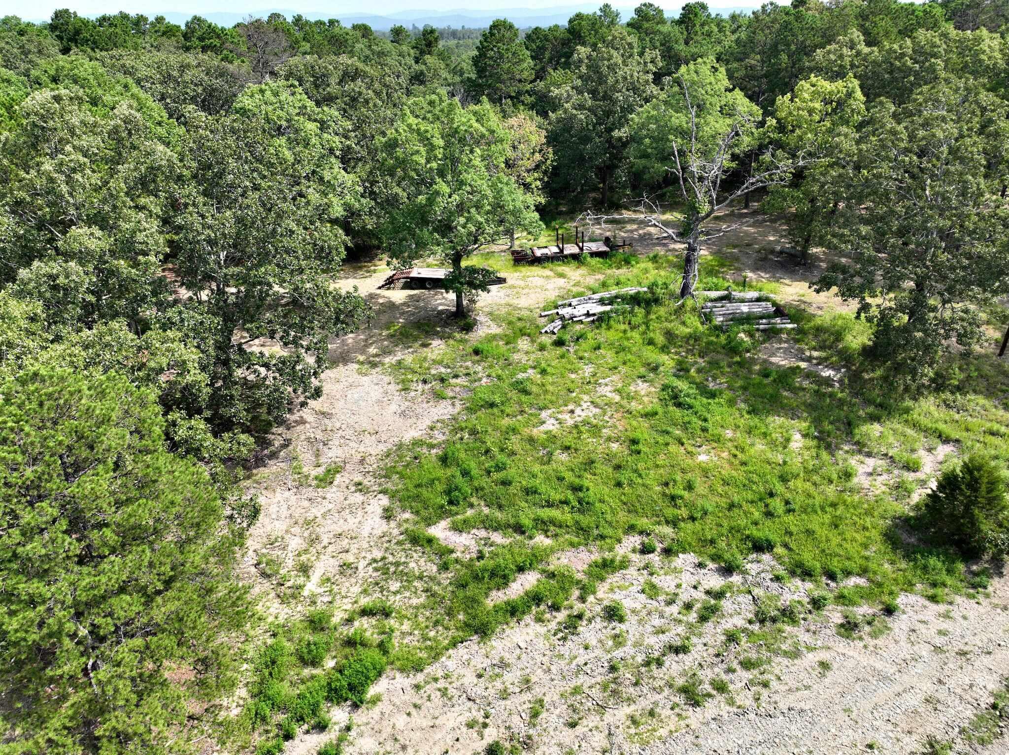 This quaint, wooded lot on a private road includes a wonderful spot for building. Rural water and power are both available, and there is also a well located on site. The property is very close to ATV trails, so it would make a good recreation property! A perk test has been done, and there are some restrictions; no mobiles allowed.