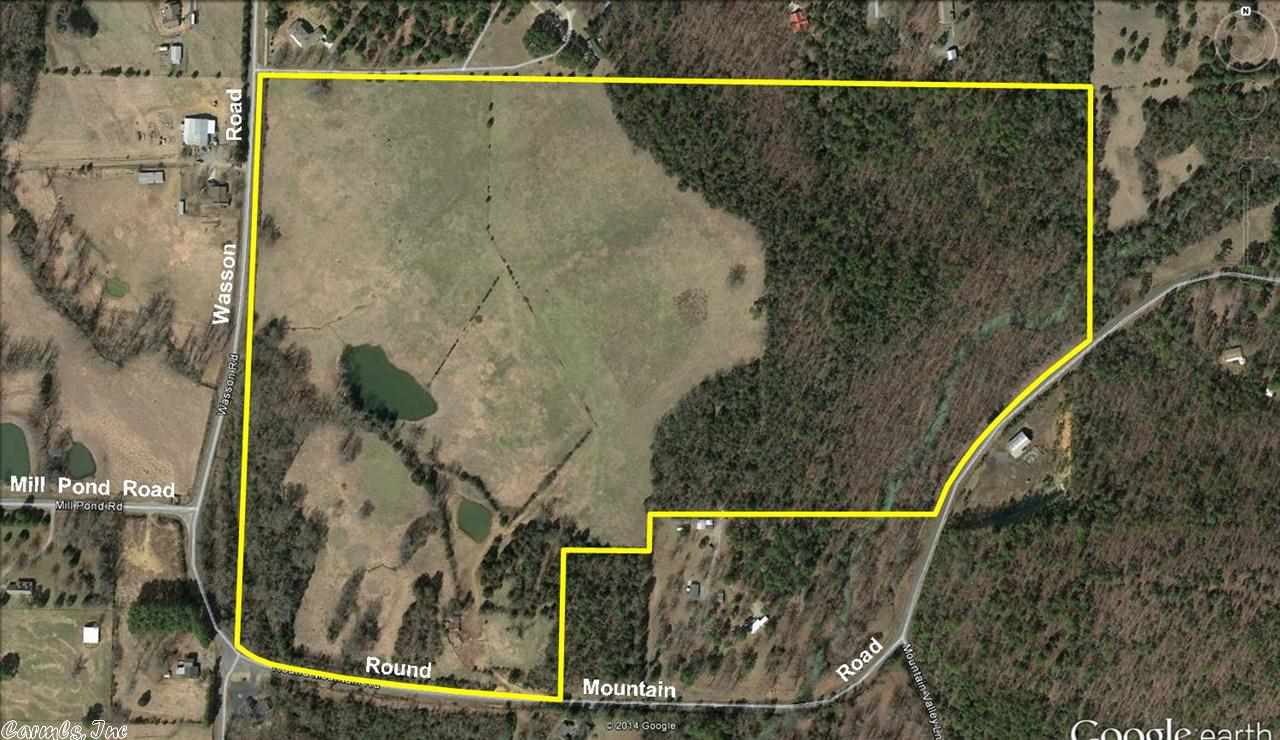 PRIME LAND FOR SALE! Located on Wasson Road at the Round Mountain-Mill Pond intersection, this 84.26 acre parcel is adjacent to the city limits of Conway and the future Conway Western Loop. This parcel is ready for development or a buyer looking for a large tract with easy access to Conway amenities.