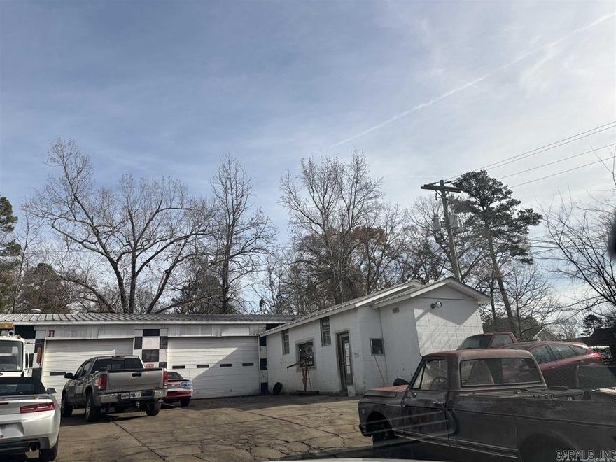 only includes building and land. great location close to interstate, has large shop area and office. Property is fenced