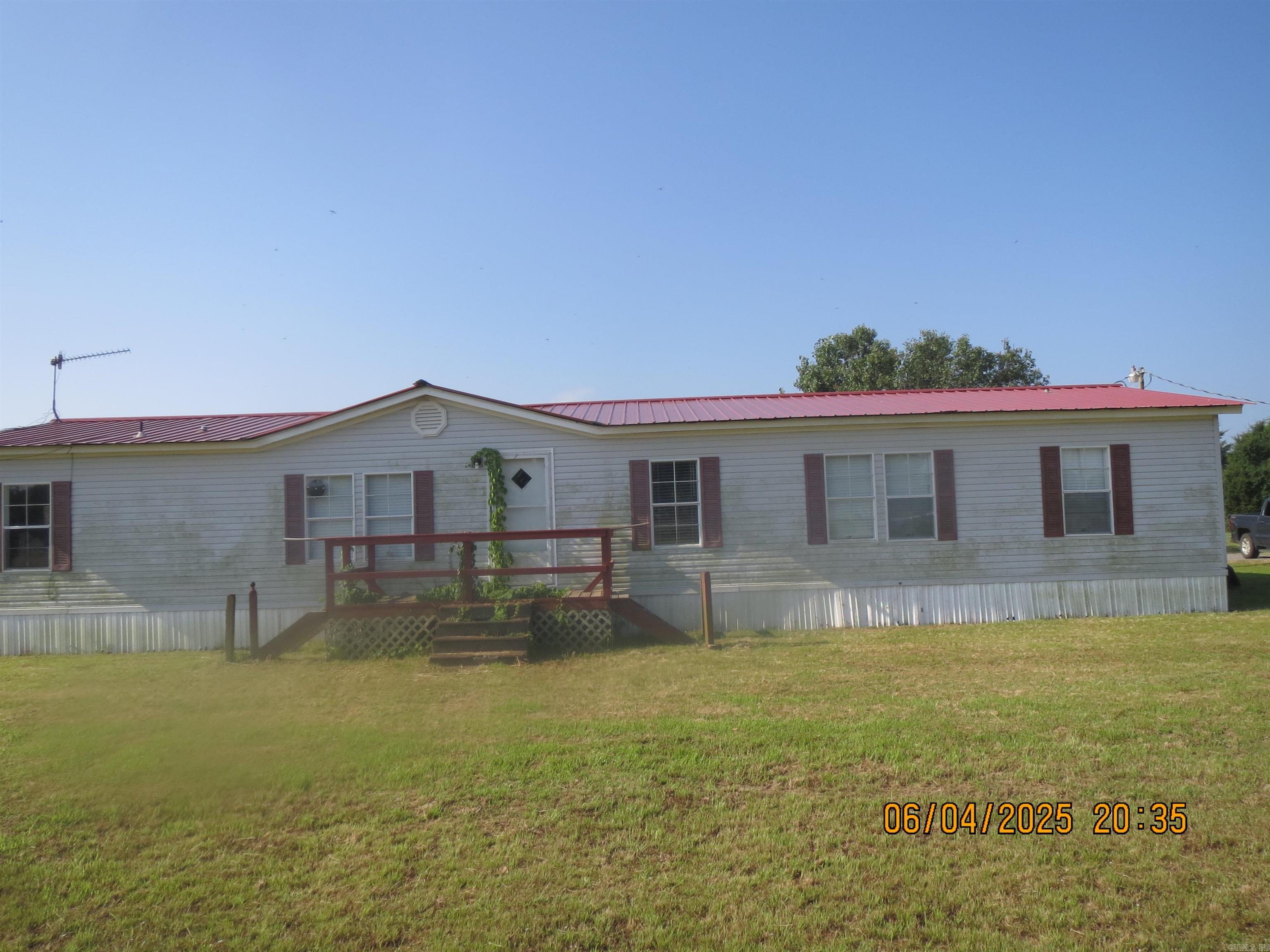This 3 bed 2 bath home has an approximately 2 year old metal roof, New hot water tank, A storage building, and a chain link fenced in back yard.