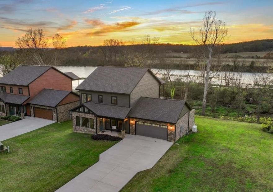 Beautiful Home on the Banks of the White River in Cotter!