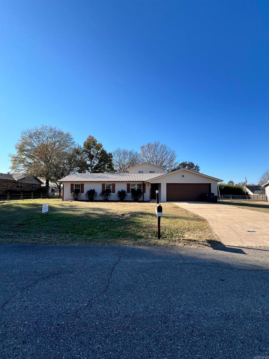 Newly remodeled and move in ready conveniently located on the west side of town!  Featuring 4 bedrooms, 2 baths, fresh paint, flooring, new tile shower and new bathtub,  fixtures, appliances and more!  Home features a bonus room and fenced yard with storm cellar. Check it out today!
