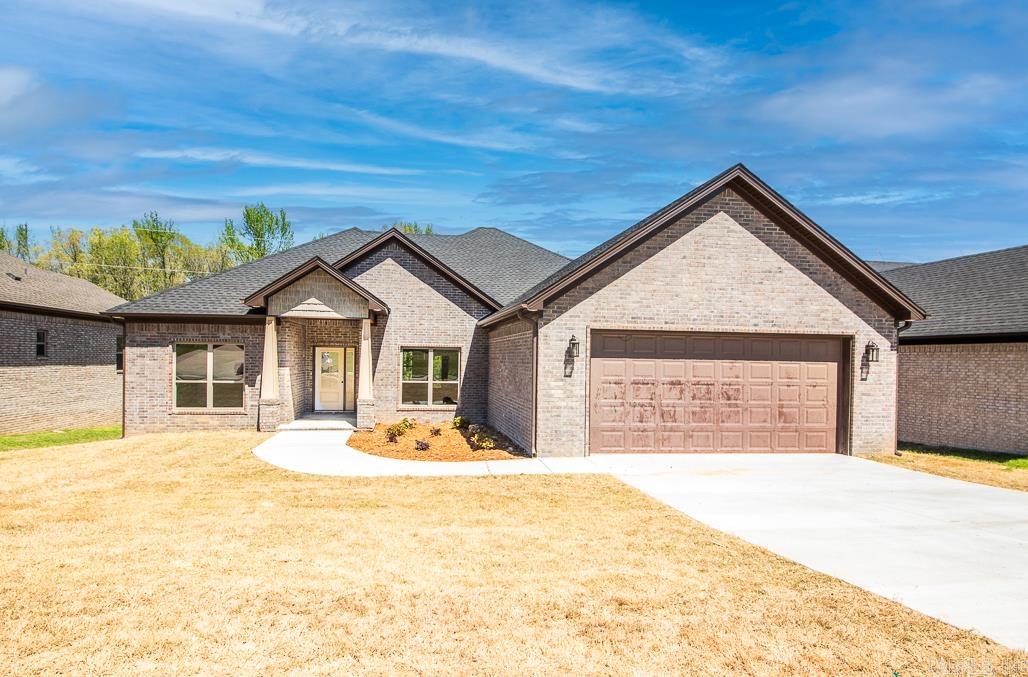 Introducing a stunning new construction home for sale in the popular Millers Glen Subdivision. This beautiful property features 3 bedrooms, 2 baths and an open floor plan. The kitchen has a pantry, pretty countertops and back splash, under cabinet lighting, stainless steel appliances, gas stove. Dining room area is open to the living room but distinguished with a pretty column. Living room has gas fireplace. Waterproof laminate flooring - no carpet! Master suite is separate from the other 2 bedrooms, master bath has walk in tiled shower and soaking tub, 2 sinks, make-up vanity and walk in closet with built in chest. Large laundry room with locker for storage. Covered back patio to enjoy the outdoors! Move in ready!